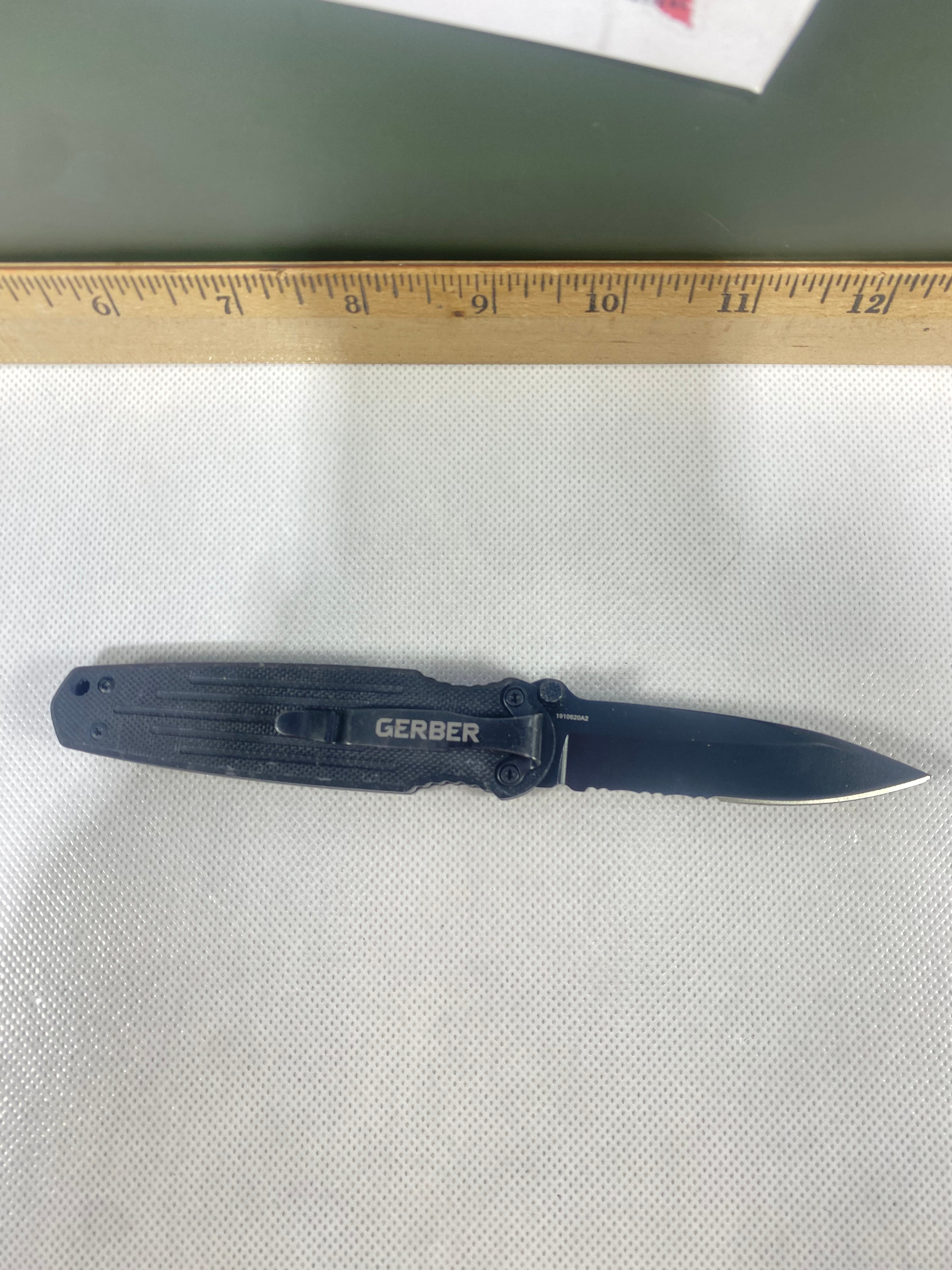 Gerber #-11. Mini Covert. Light usage. Ding on tip.