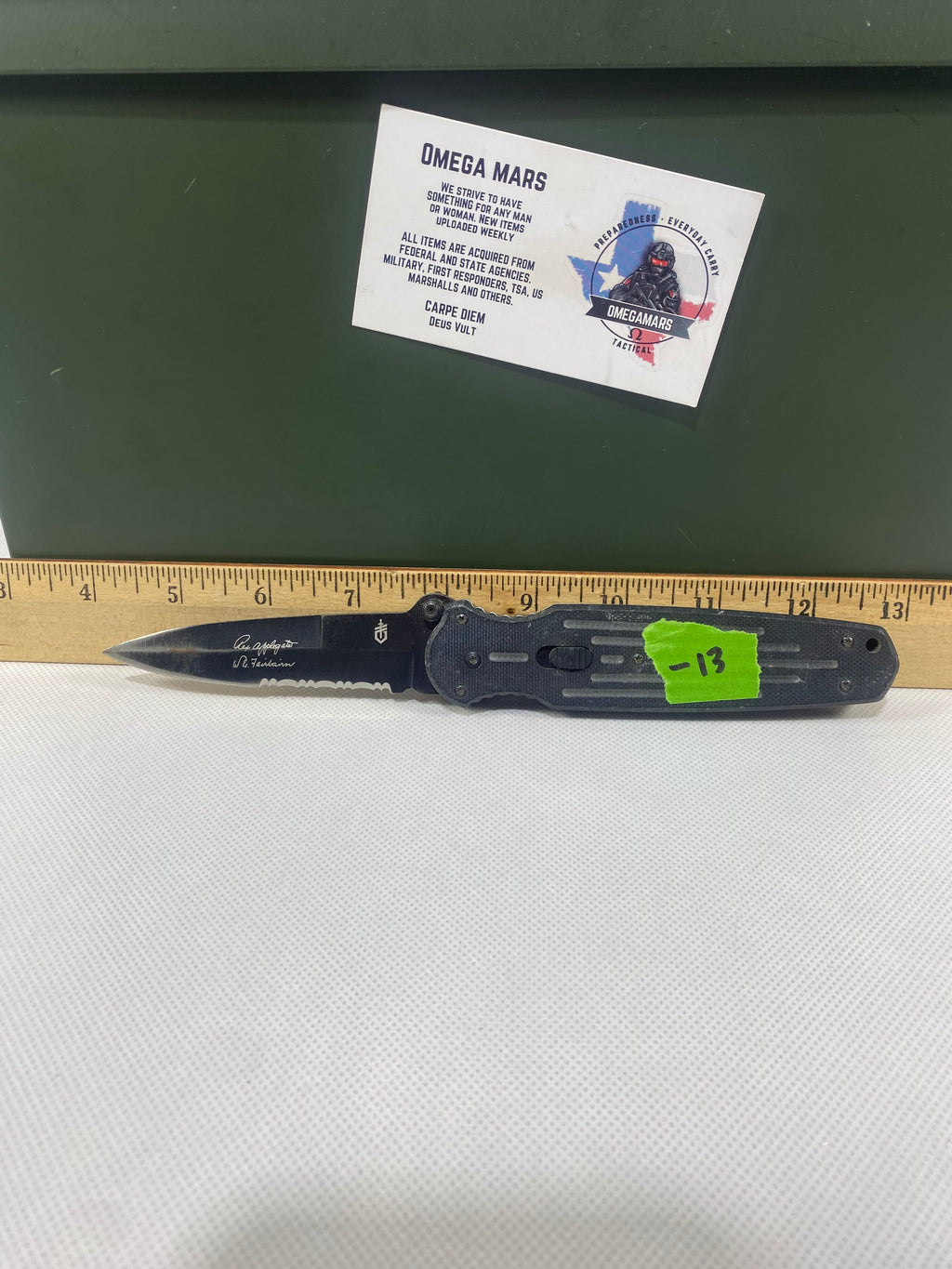 Gerber #-13. FAST Folding Covert. Light usage. Broken Tip. Resharpened.