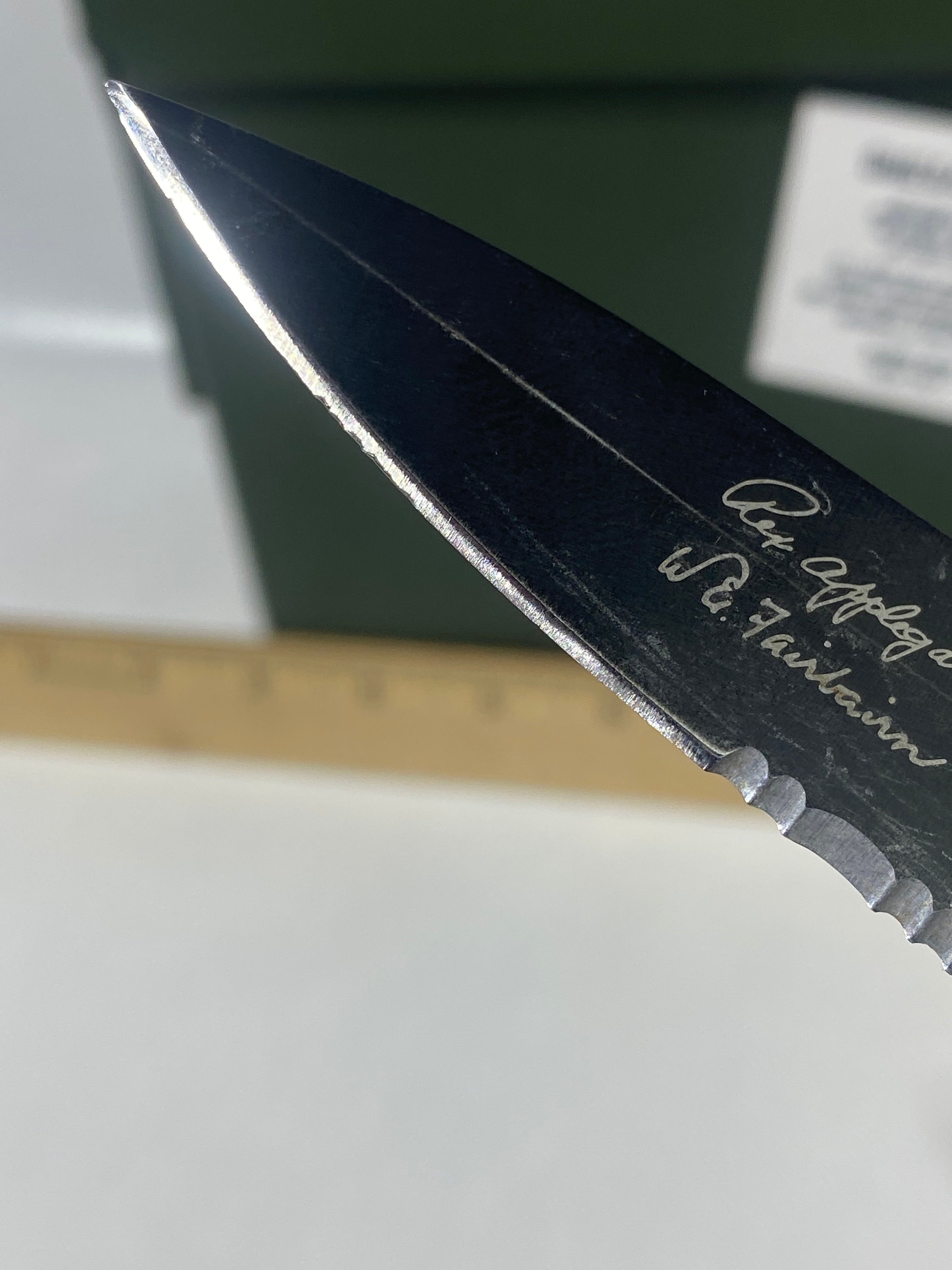 Gerber #-14. FAST Folding Covert. Light usage. Blade a little loose. Pocket clip missing a screw. Dings on the blade.
