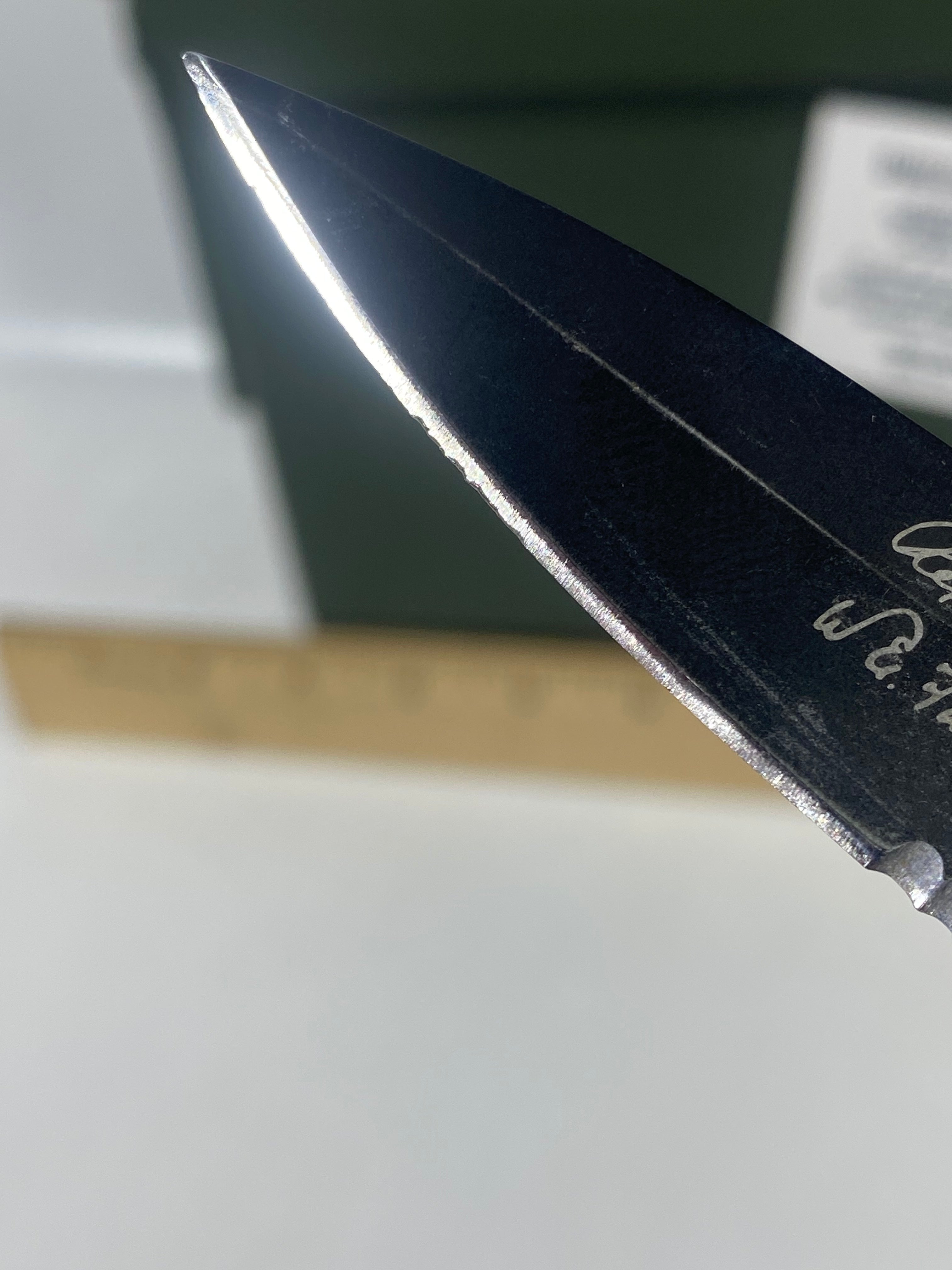 Gerber #-14. FAST Folding Covert. Light usage. Blade a little loose. Pocket clip missing a screw. Dings on the blade.