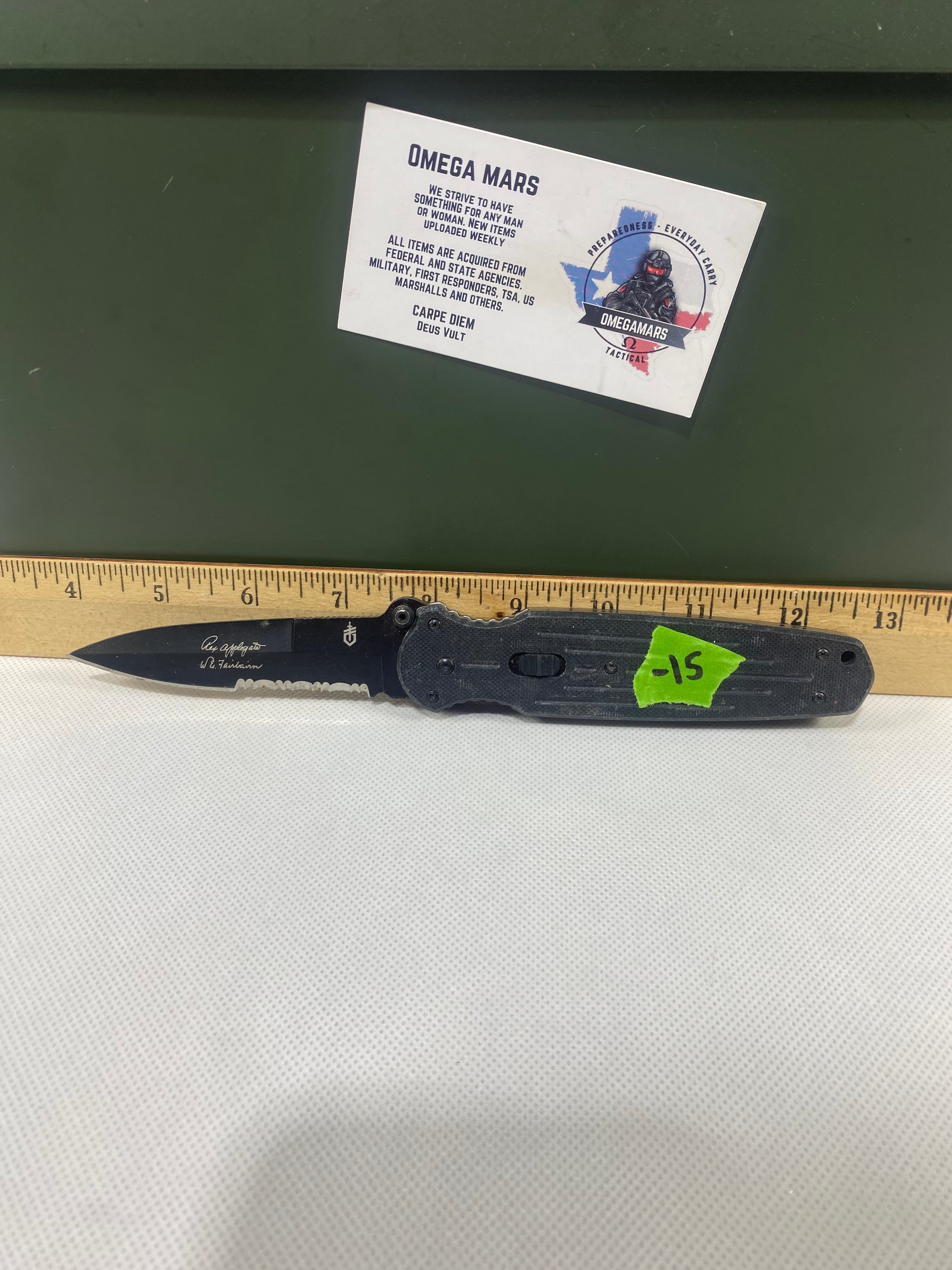 Gerber #-15. FAST Folding Covert. Light usage. Dings on the blade.