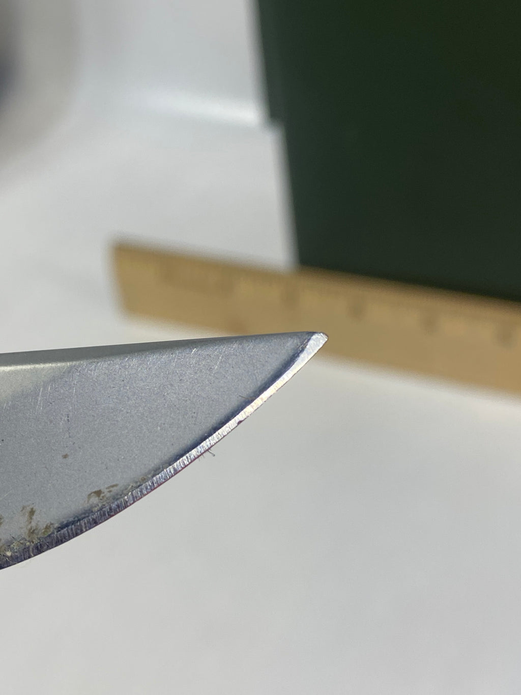 Gerber #-16. EZ Out. Light usage. Dirty. Ding on the blade.