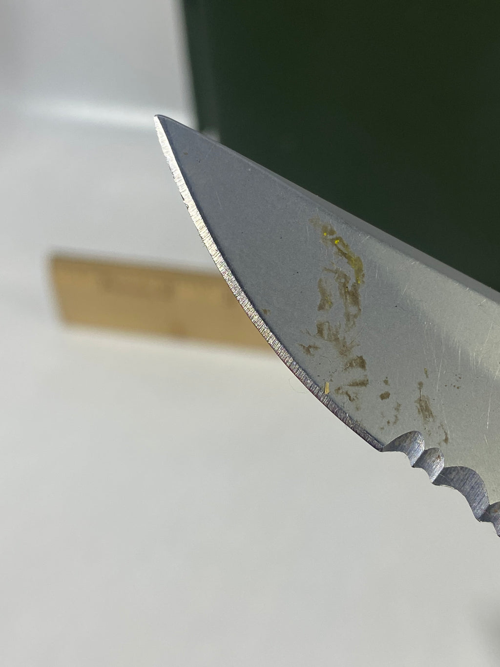 Gerber #-16. EZ Out. Light usage. Dirty. Ding on the blade.