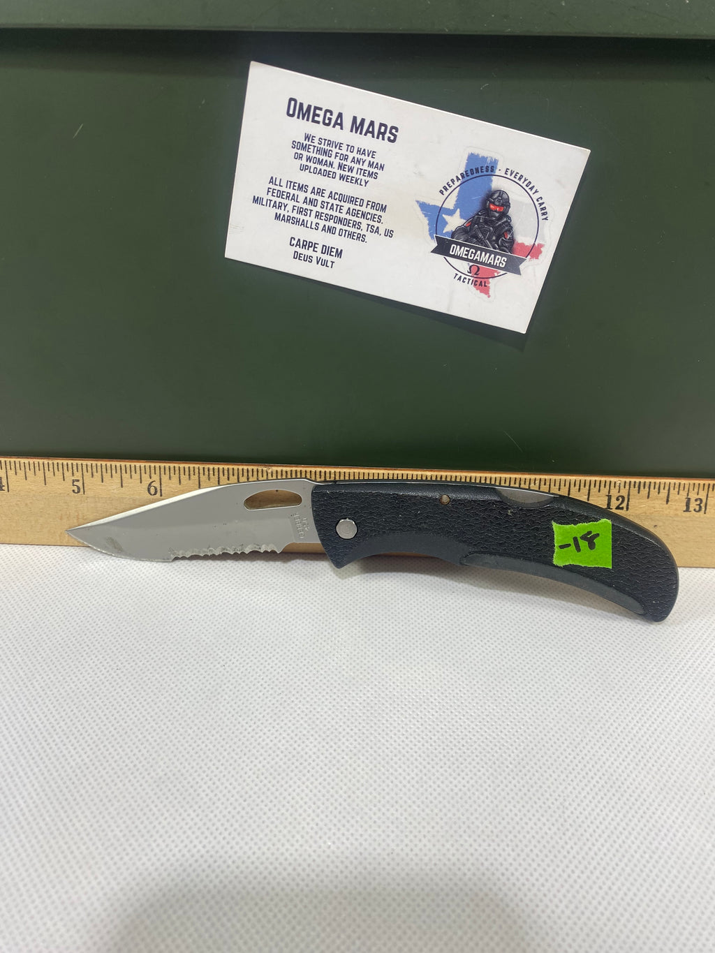 Gerber #-18. EZ Out. Light usage. Clip bent out.