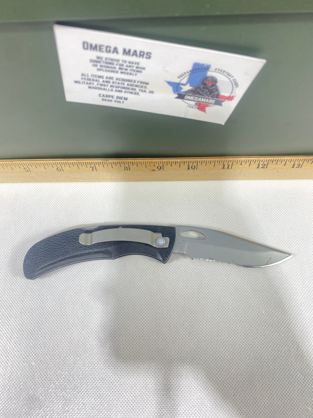 Gerber #-18. EZ Out. Light usage. Clip bent out.