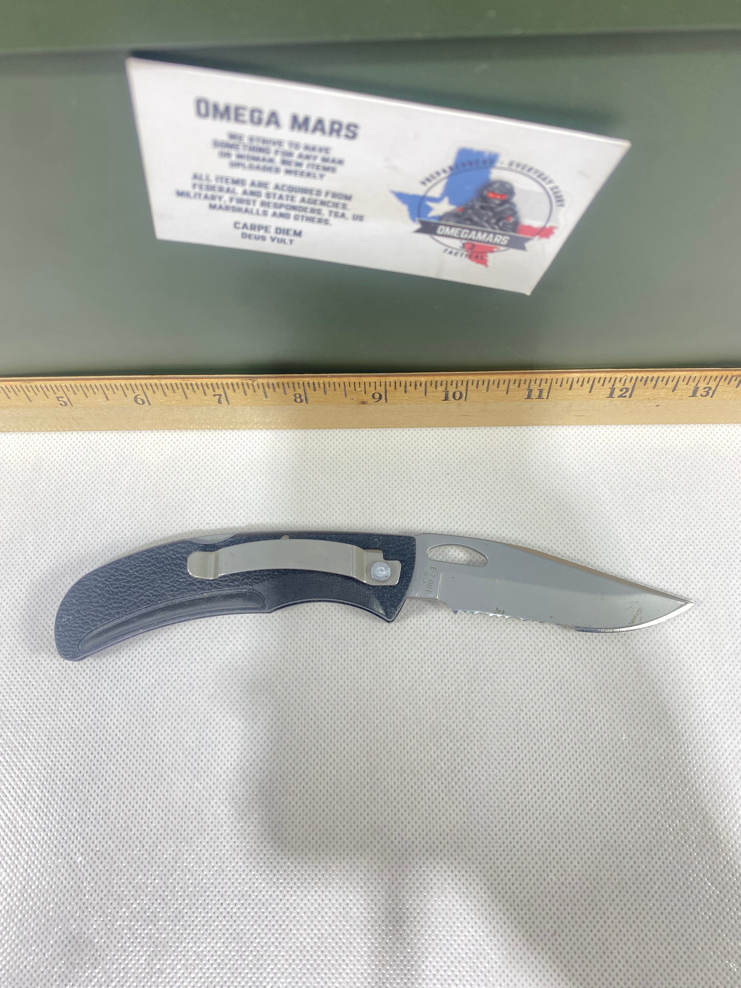 Gerber #-18. EZ Out. Light usage. Clip bent out.