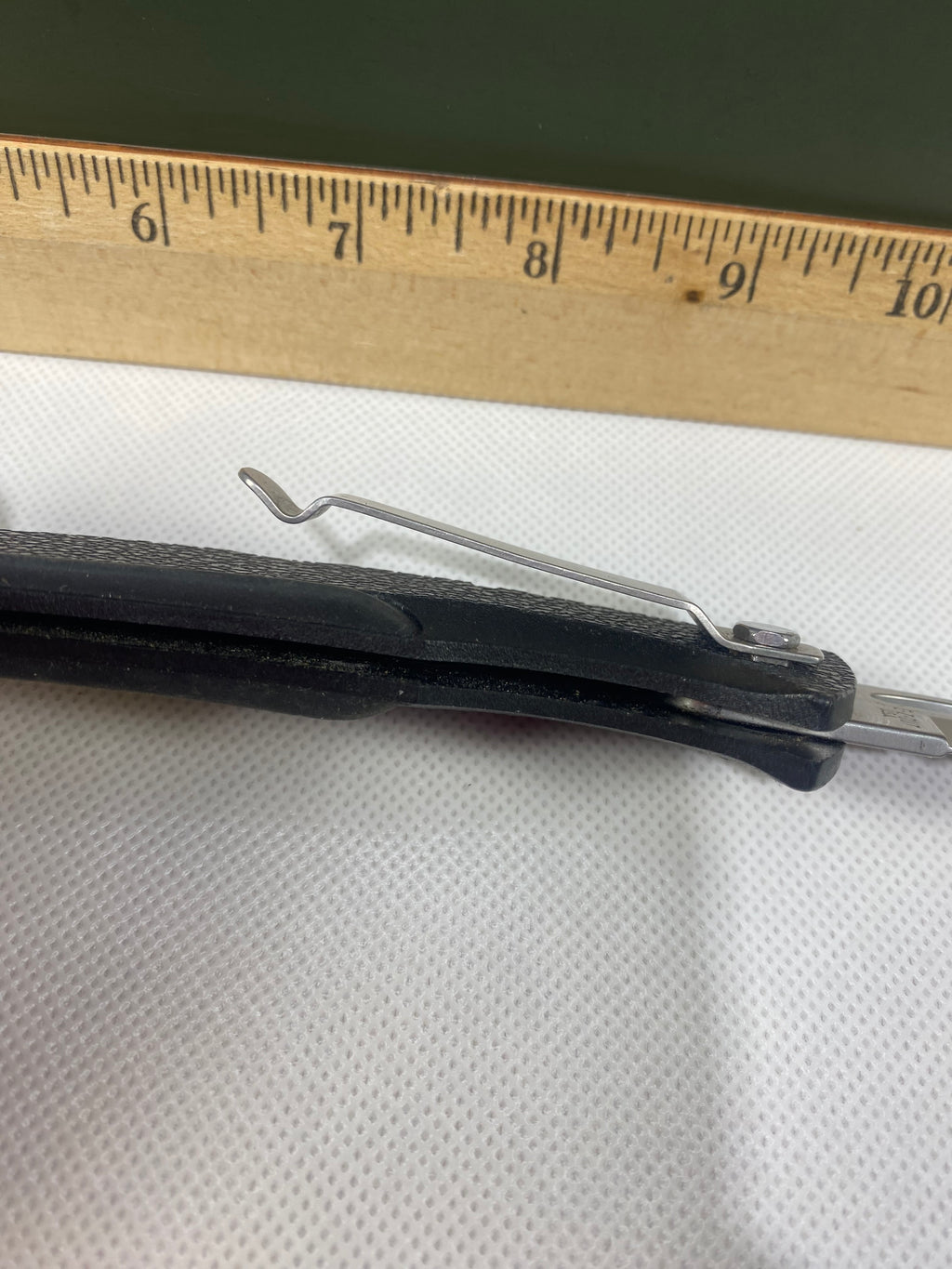 Gerber #-18. EZ Out. Light usage. Clip bent out.