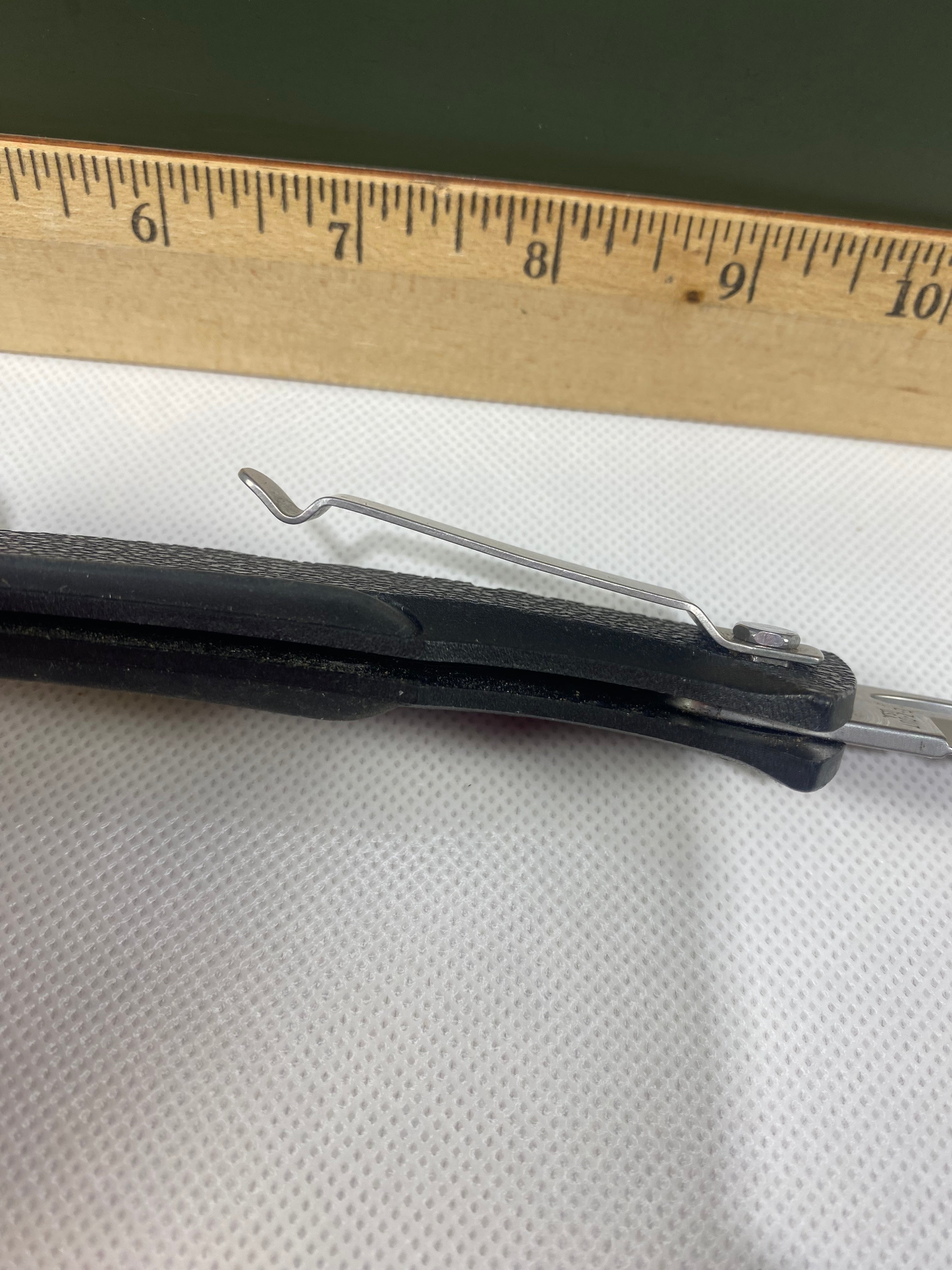 Gerber #-18. EZ Out. Light usage. Clip bent out.