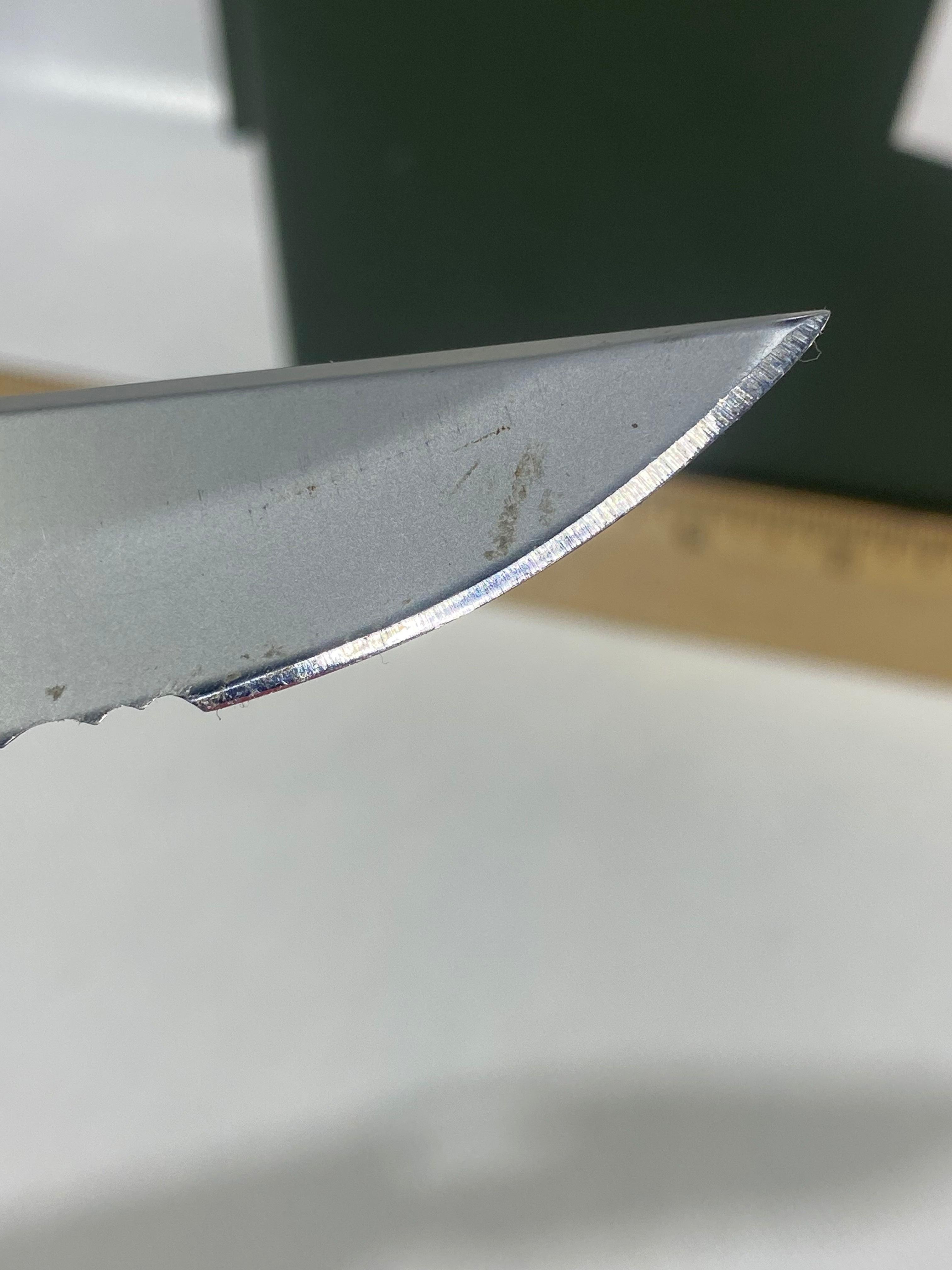 Gerber #-18. EZ Out. Light usage. Clip bent out.