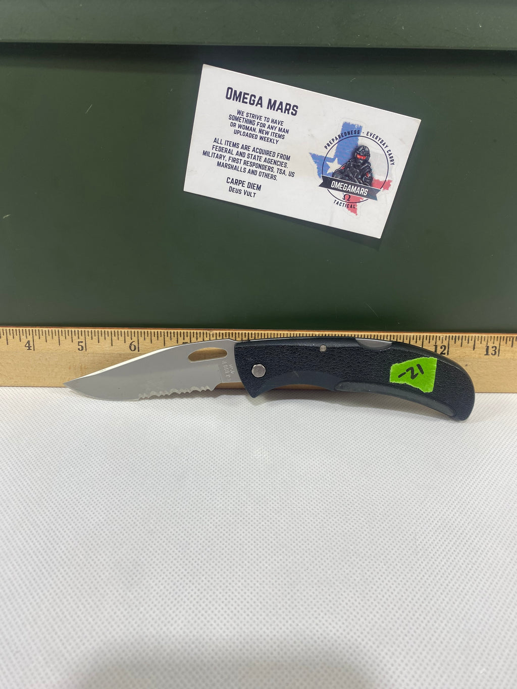 Gerber #-21. EZ Out. Light usage. Resharpened.