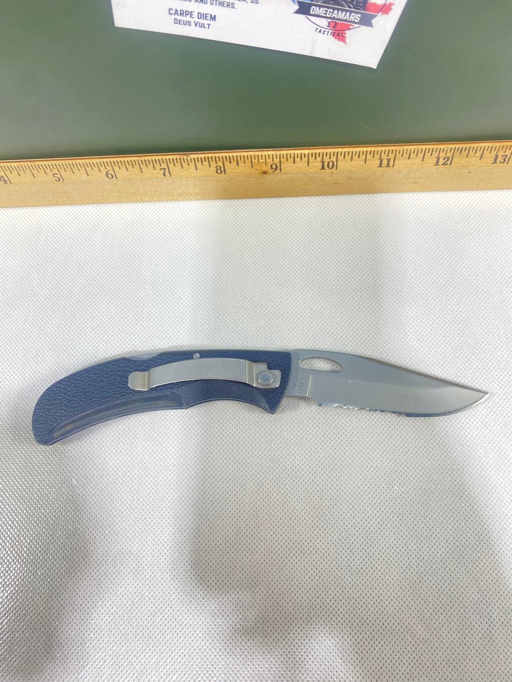 Gerber #-21. EZ Out. Light usage. Resharpened.