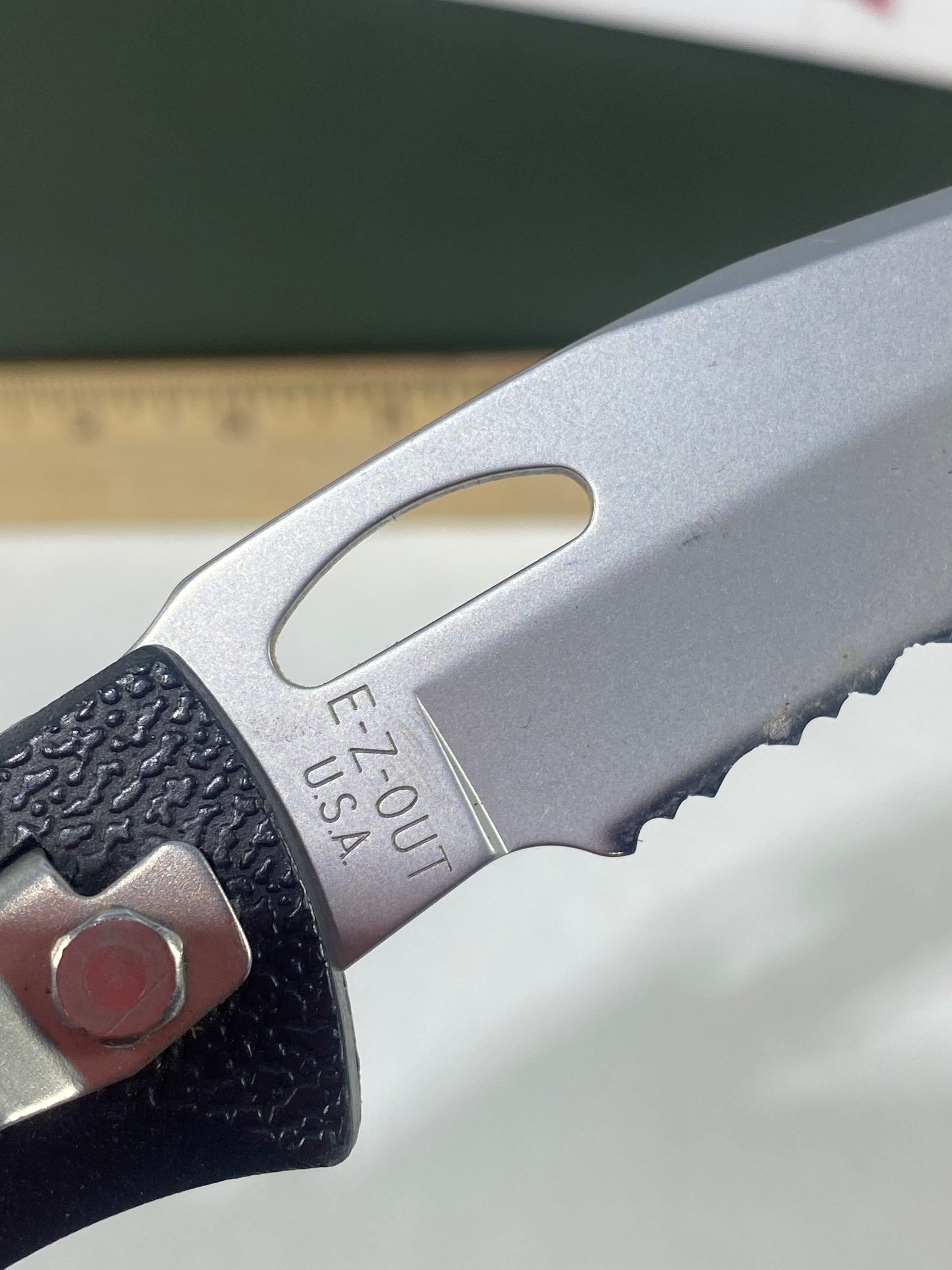 Gerber #-21. EZ Out. Light usage. Resharpened.