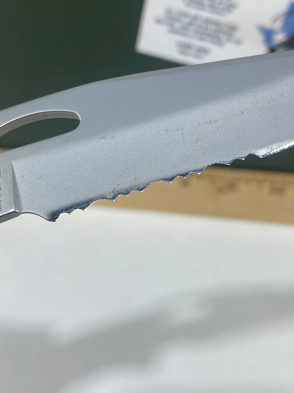 Gerber #-21. EZ Out. Light usage. Resharpened.