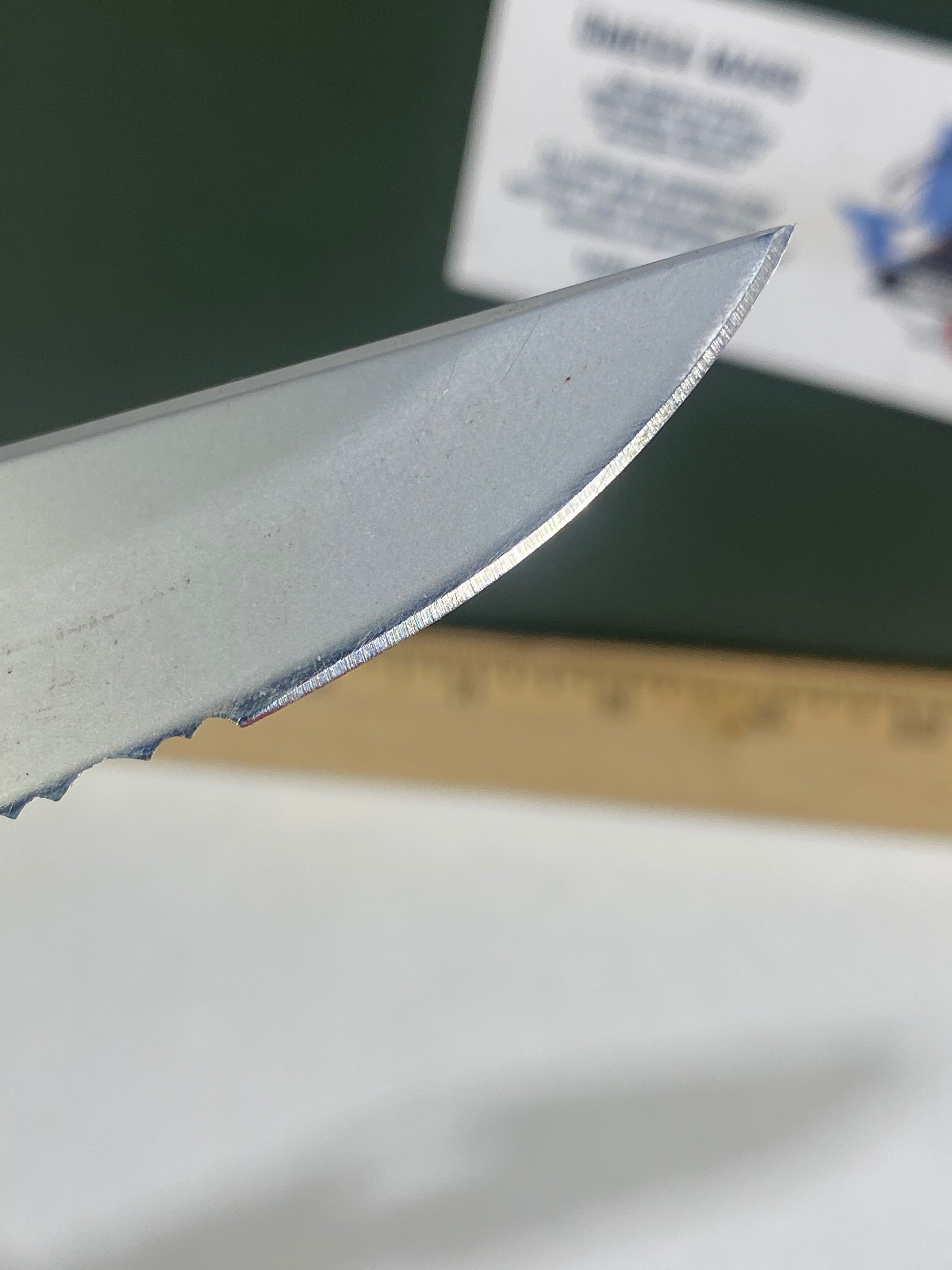 Gerber #-21. EZ Out. Light usage. Resharpened.