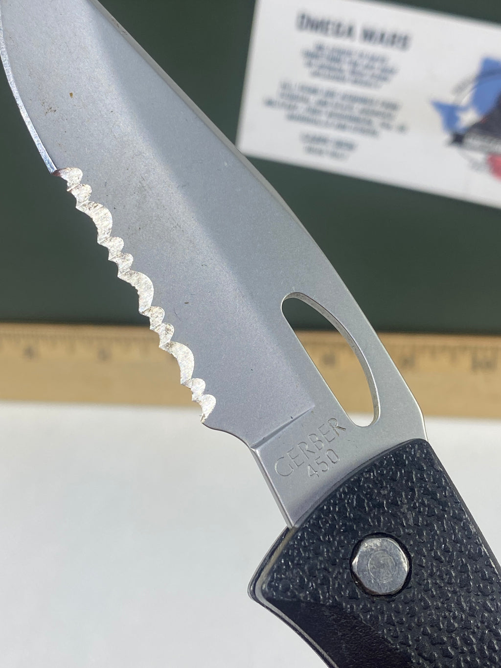Gerber #-21. EZ Out. Light usage. Resharpened.
