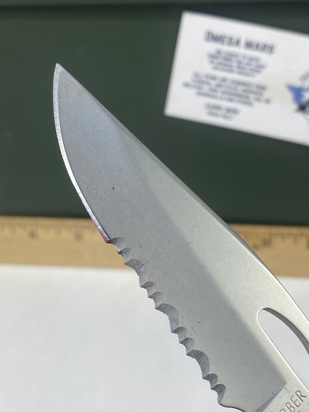 Gerber #-21. EZ Out. Light usage. Resharpened.