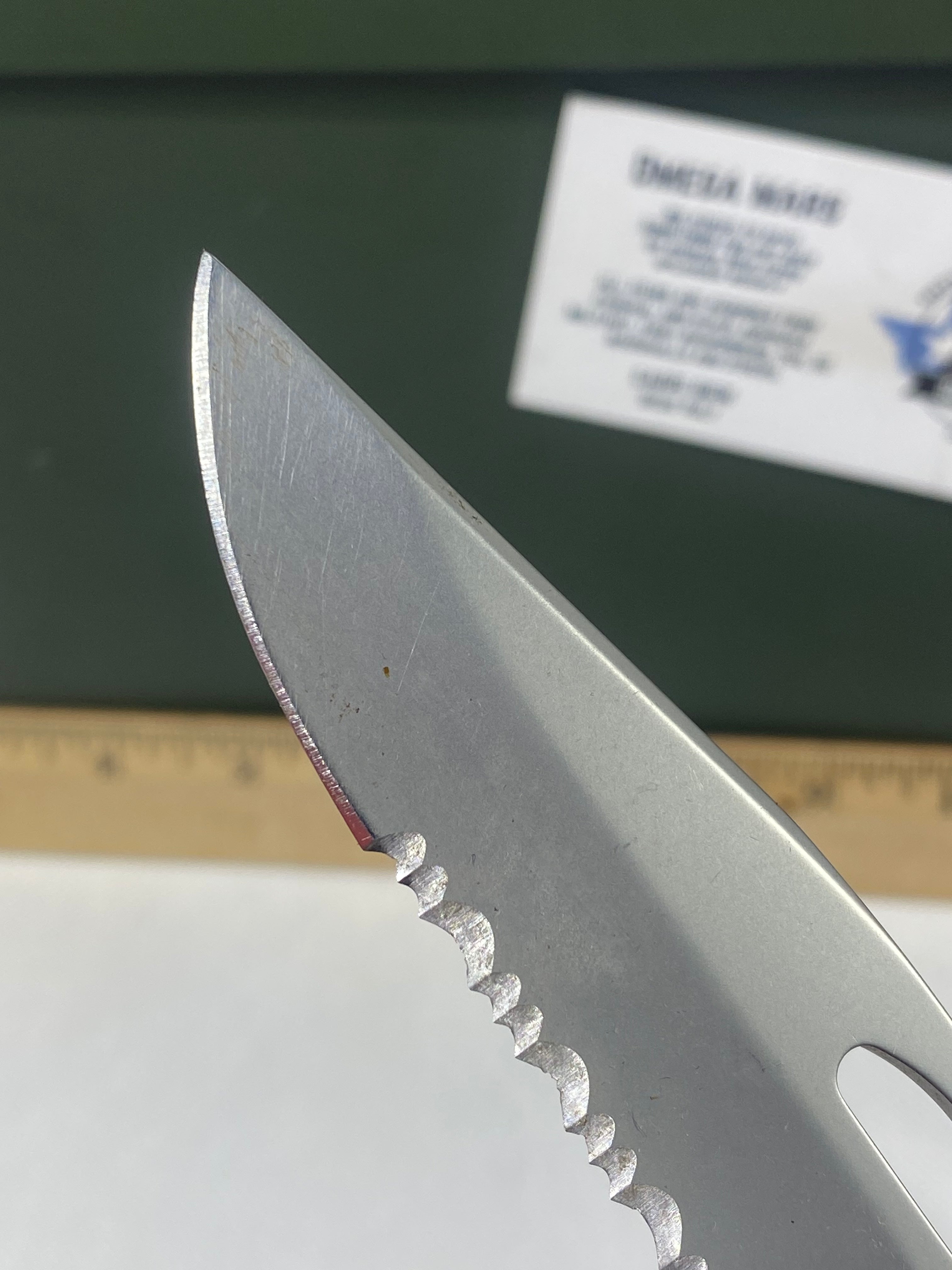 Gerber #-21. EZ Out. Light usage. Resharpened.