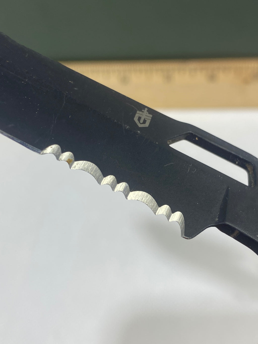 Gerber #-34. Order. Light usage. Resharpened. Dirty. Ding on blade.