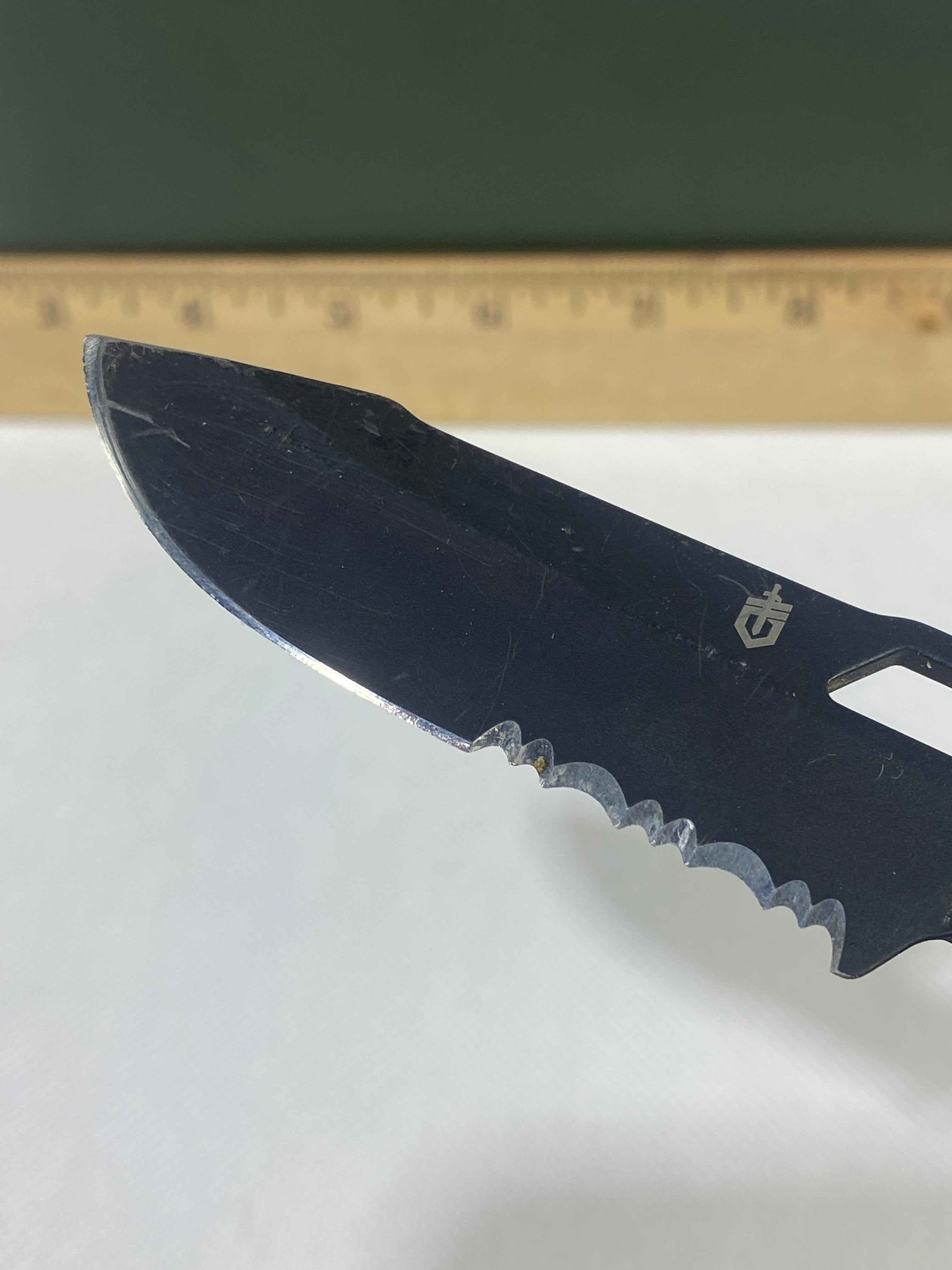 Gerber #-34. Order. Light usage. Resharpened. Dirty. Ding on blade.