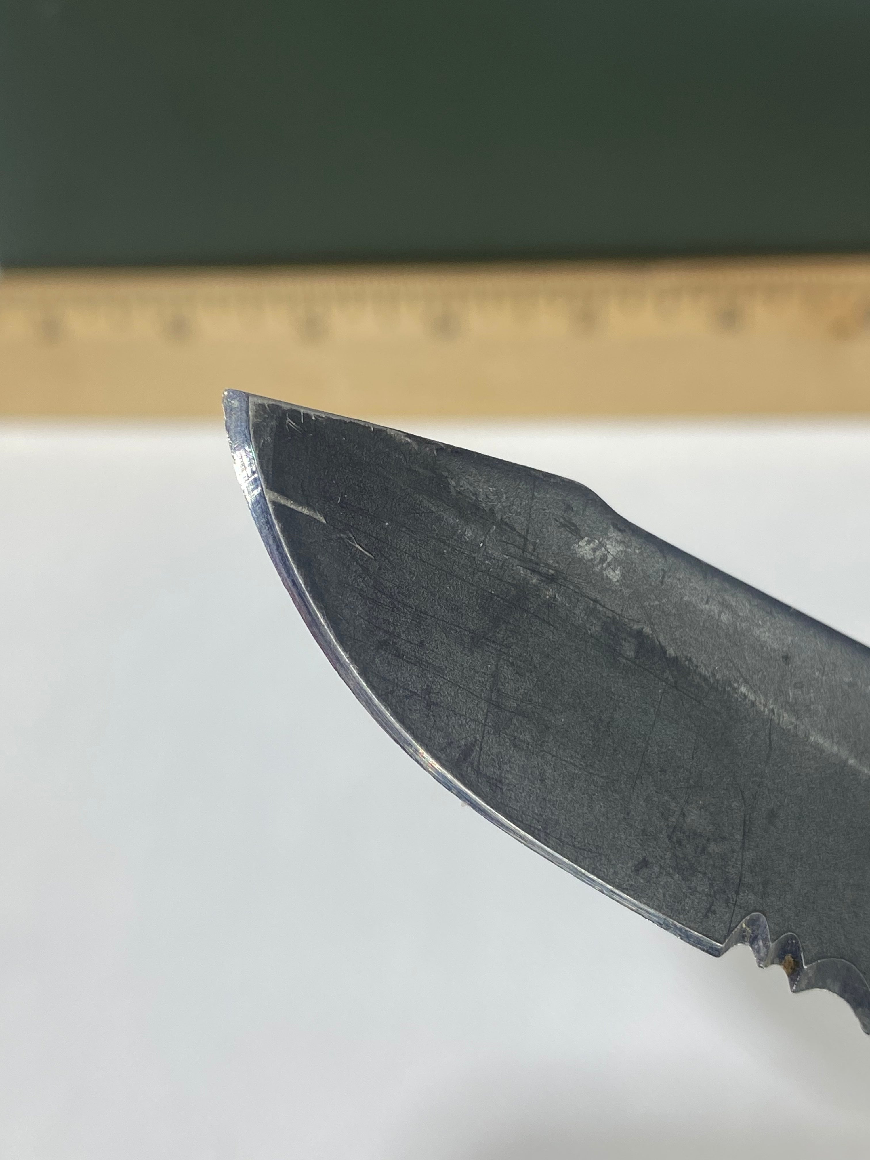 Gerber #-34. Order. Light usage. Resharpened. Dirty. Ding on blade.