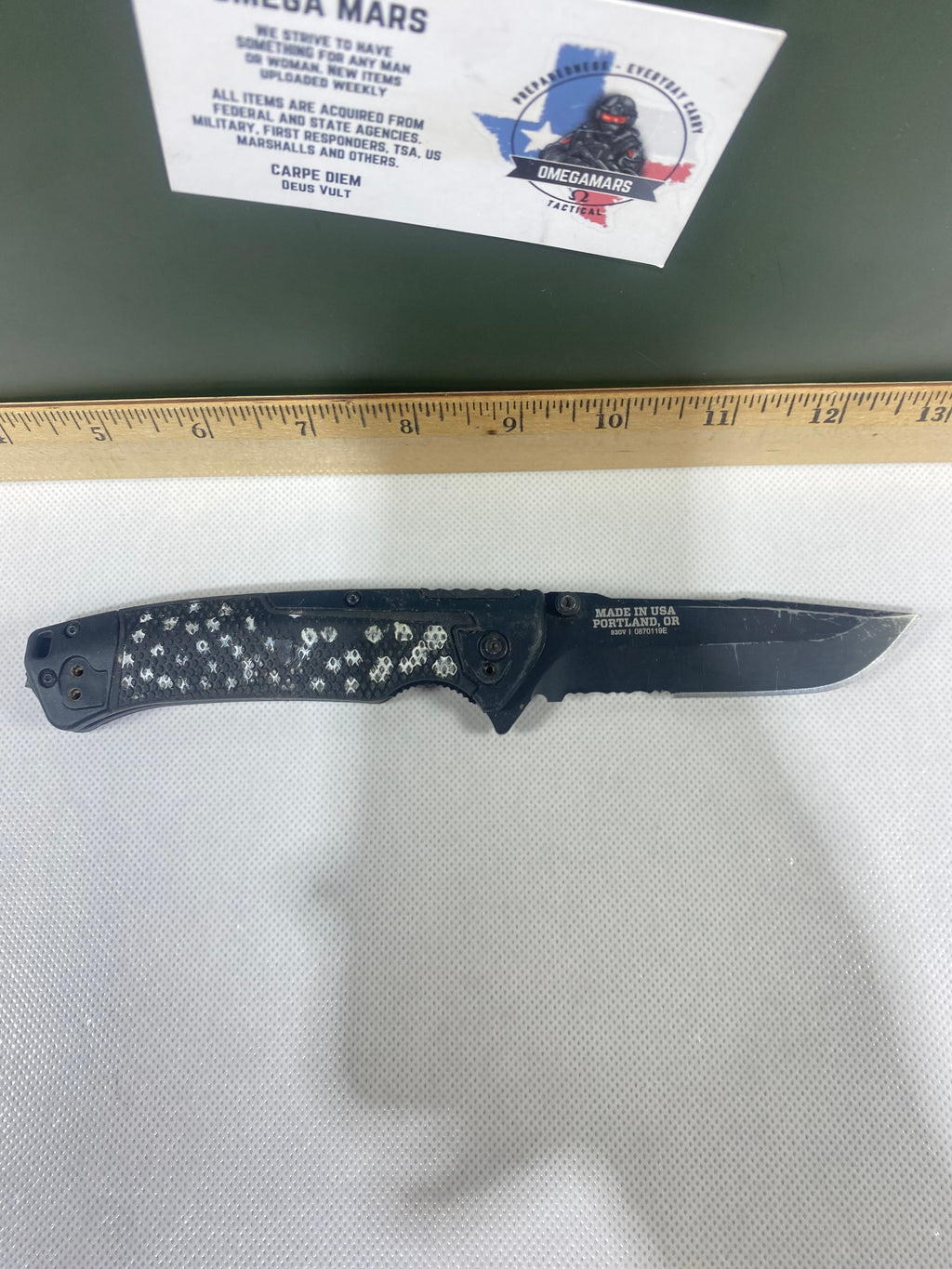 Gerber #-40. Decree. Light usage. Resharpened. Missing Pocket Clip. Dings on blade.