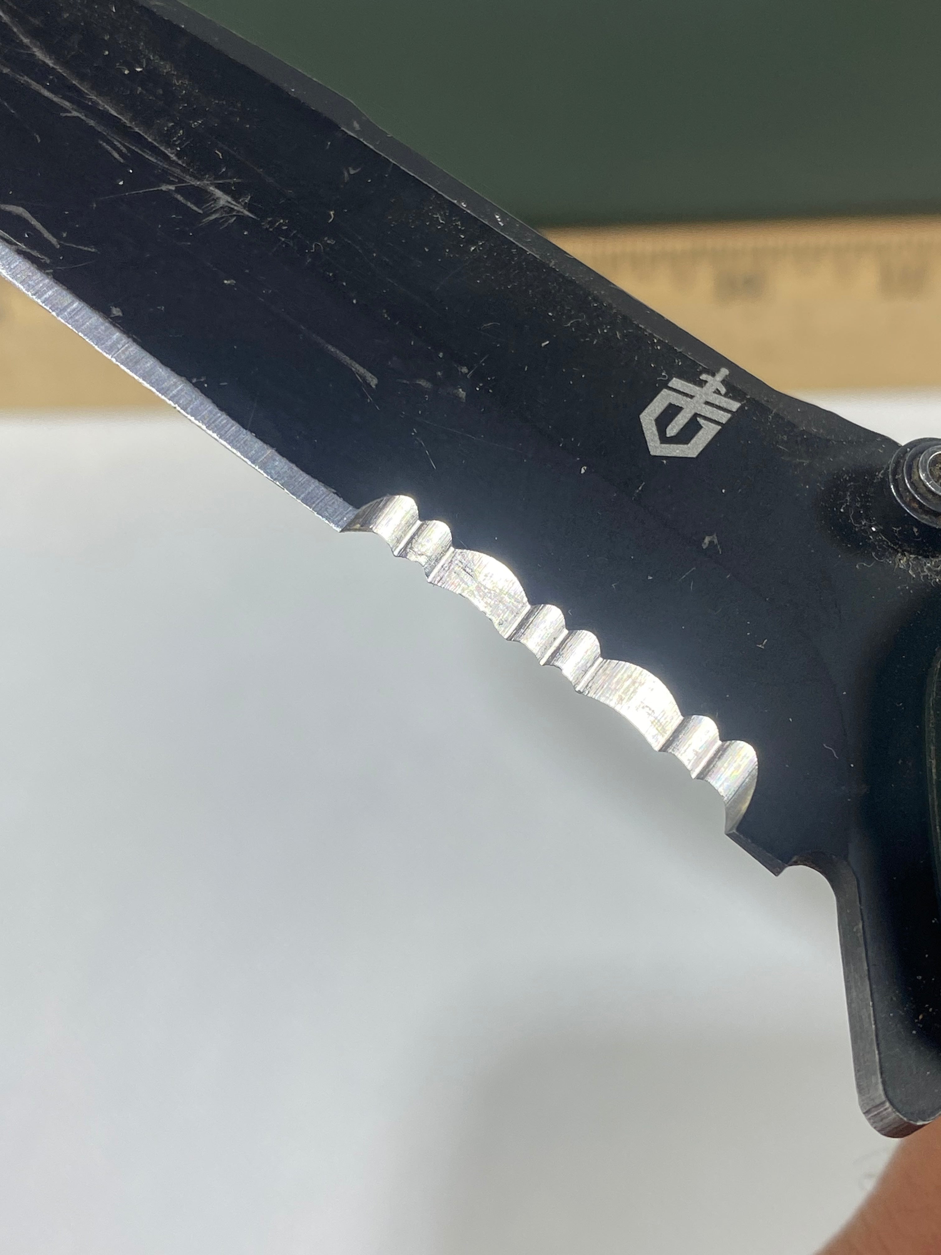 Gerber #-40. Decree. Light usage. Resharpened. Missing Pocket Clip. Dings on blade.
