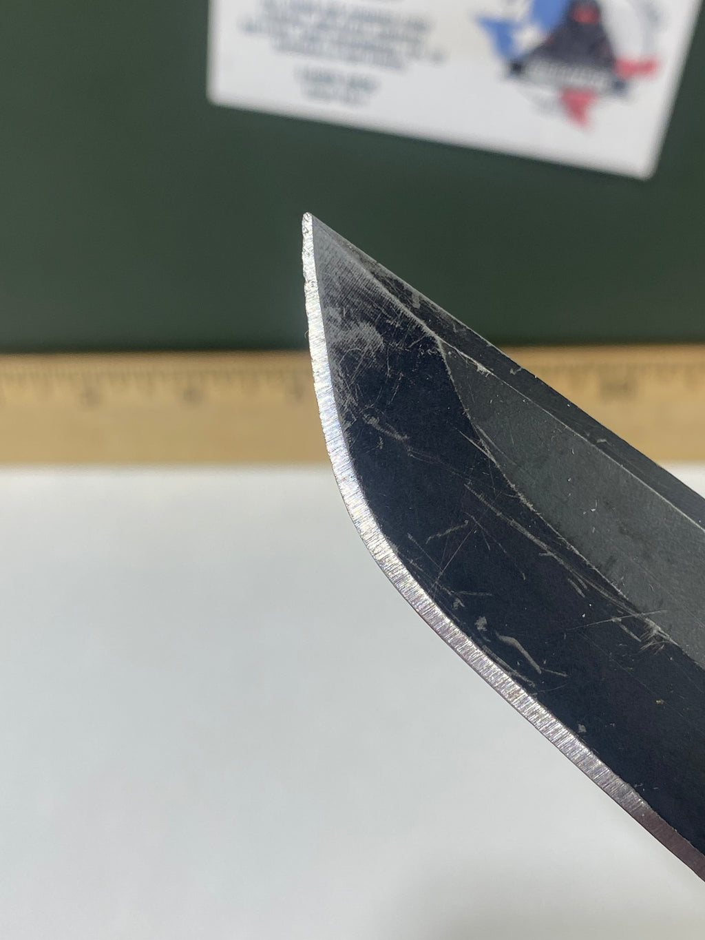 Gerber #-40. Decree. Light usage. Resharpened. Missing Pocket Clip. Dings on blade.