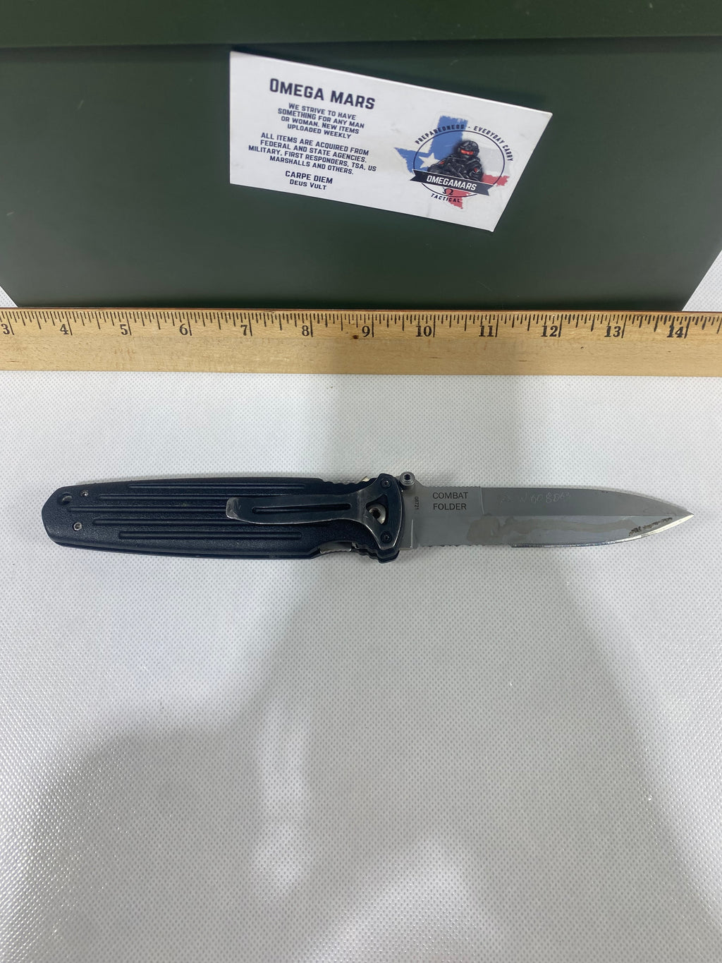 Gerber #-45. Applegate-Fairbairn Combat Folder. Light usage. Dirty. Blade has someone's name scratched on it.