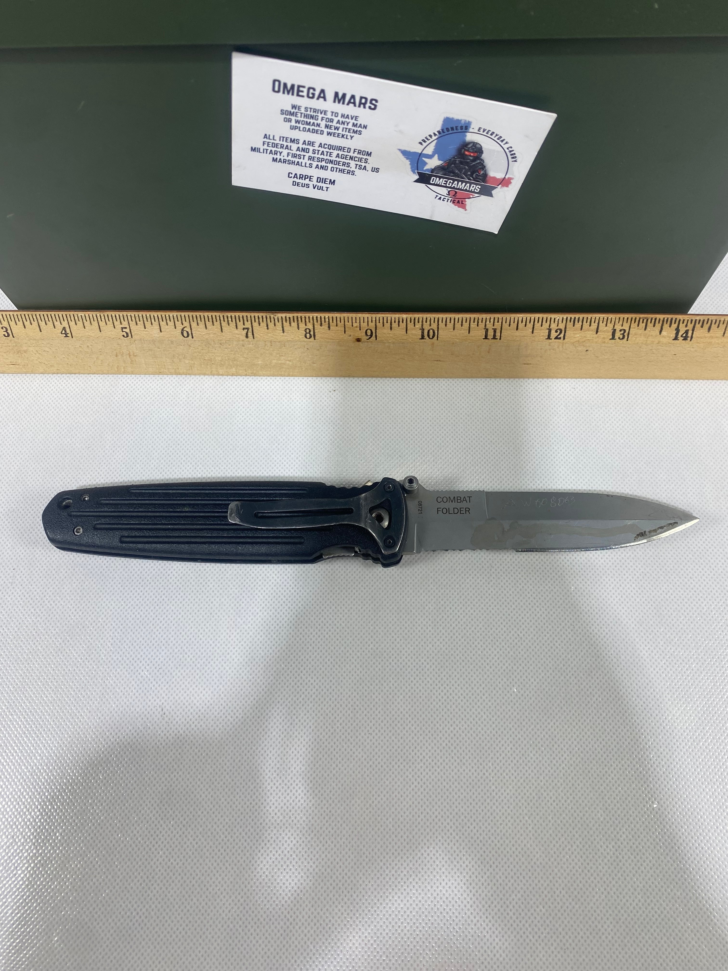 Gerber #-45. Applegate-Fairbairn Combat Folder. Light usage. Dirty. Blade has someone's name scratched on it.