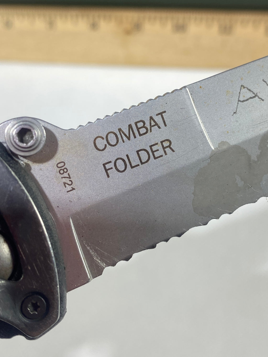 Gerber #-45. Applegate-Fairbairn Combat Folder. Light usage. Dirty. Blade has someone's name scratched on it.