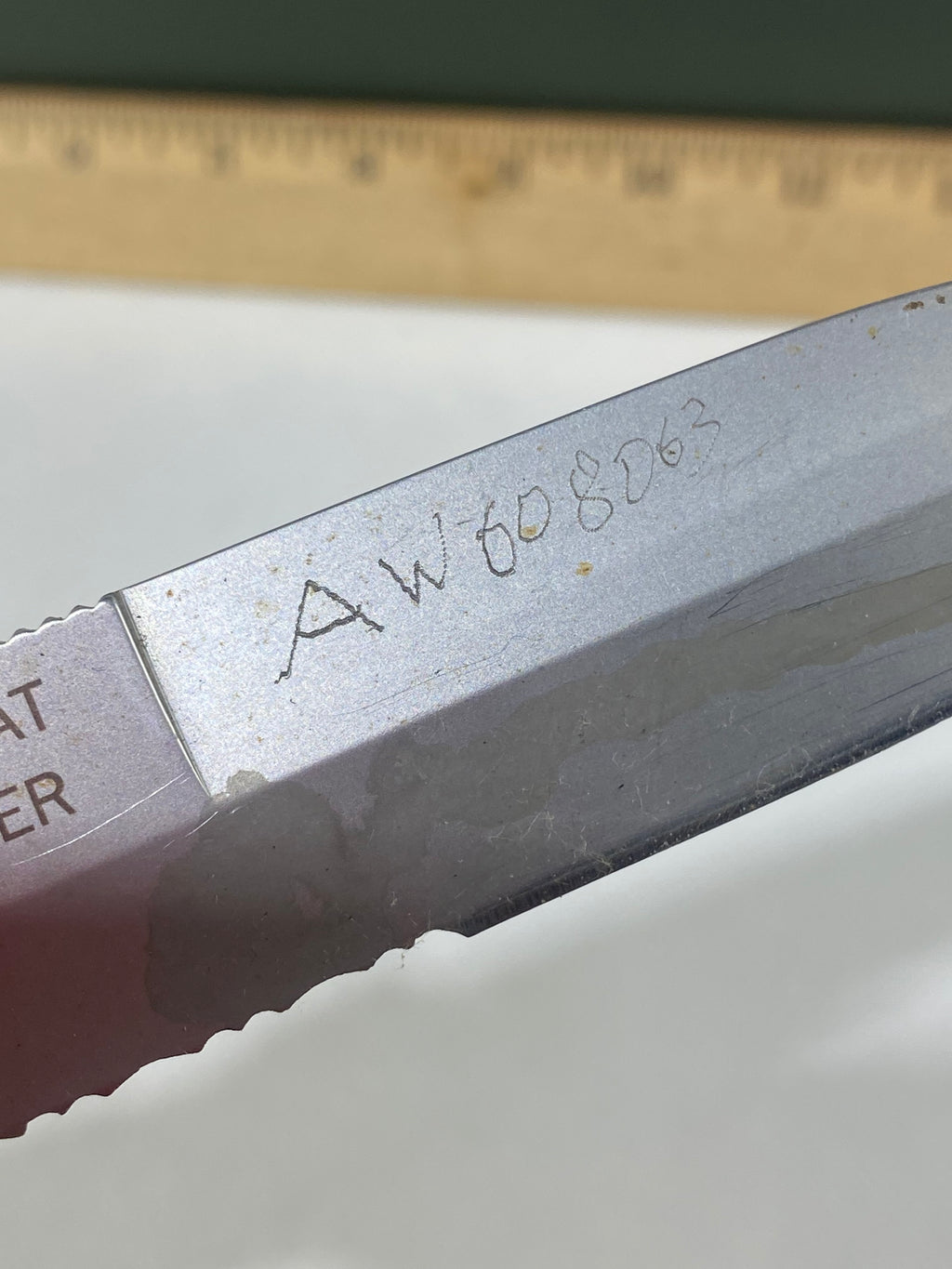 Gerber #-45. Applegate-Fairbairn Combat Folder. Light usage. Dirty. Blade has someone's name scratched on it.