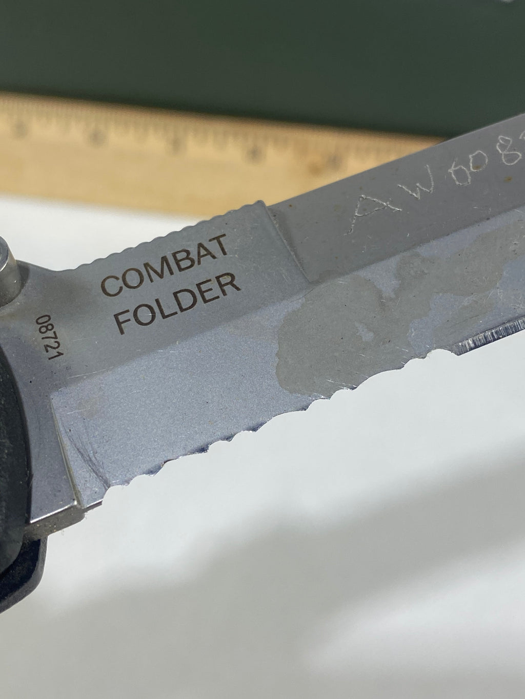 Gerber #-45. Applegate-Fairbairn Combat Folder. Light usage. Dirty. Blade has someone's name scratched on it.