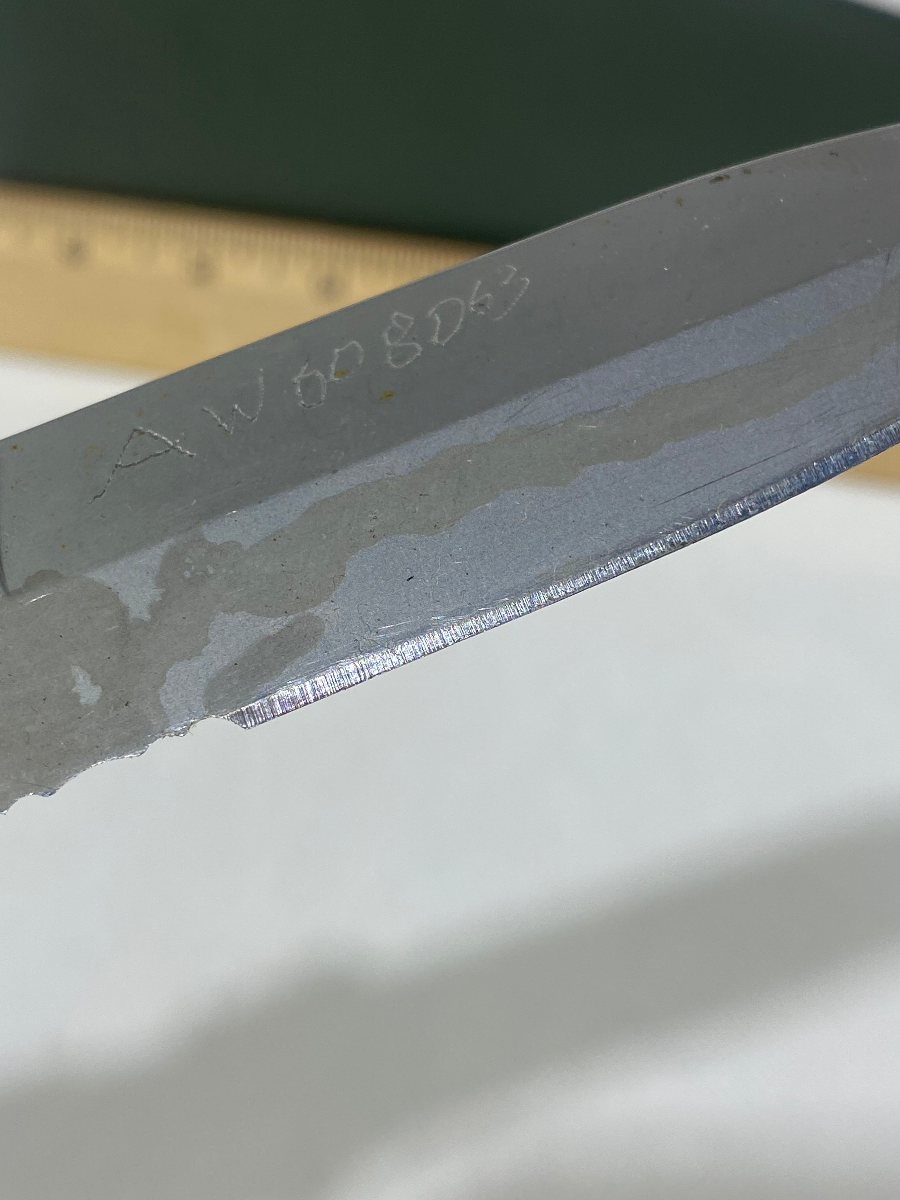 Gerber #-45. Applegate-Fairbairn Combat Folder. Light usage. Dirty. Blade has someone's name scratched on it.