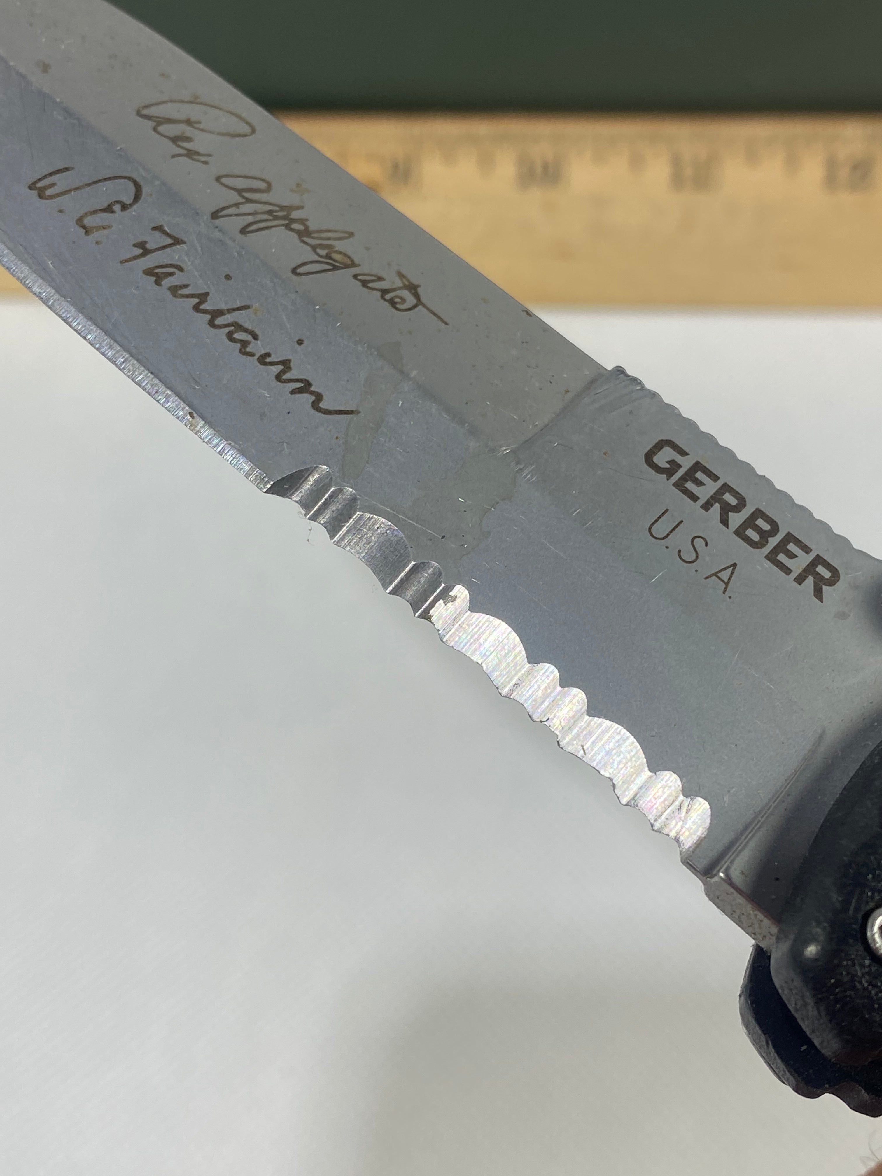 Gerber #-45. Applegate-Fairbairn Combat Folder. Light usage. Dirty. Blade has someone's name scratched on it.