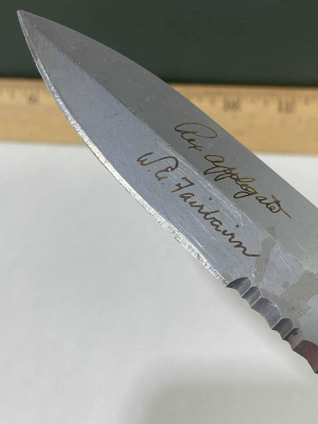 Gerber #-45. Applegate-Fairbairn Combat Folder. Light usage. Dirty. Blade has someone's name scratched on it.