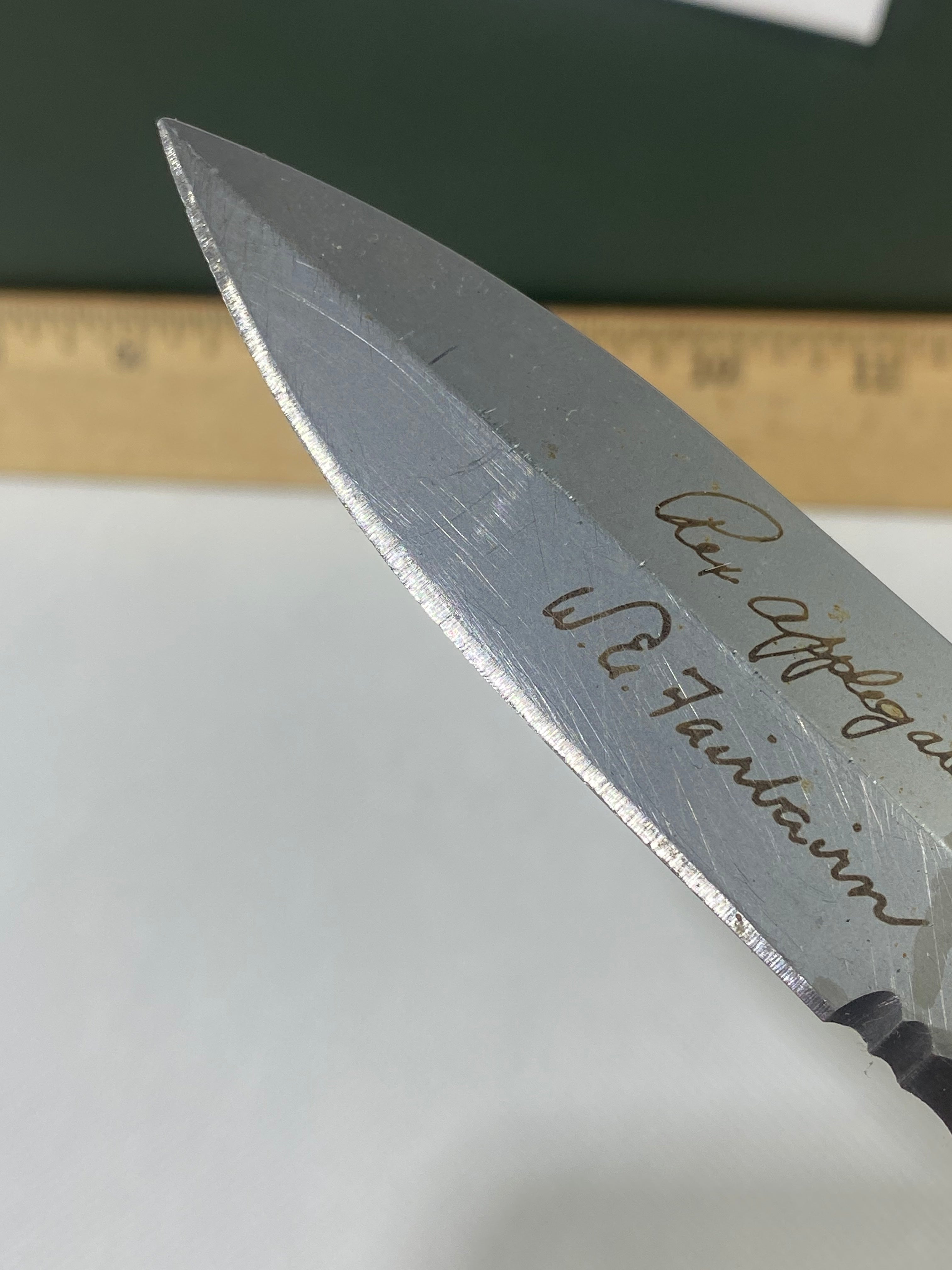 Gerber #-45. Applegate-Fairbairn Combat Folder. Light usage. Dirty. Blade has someone's name scratched on it.