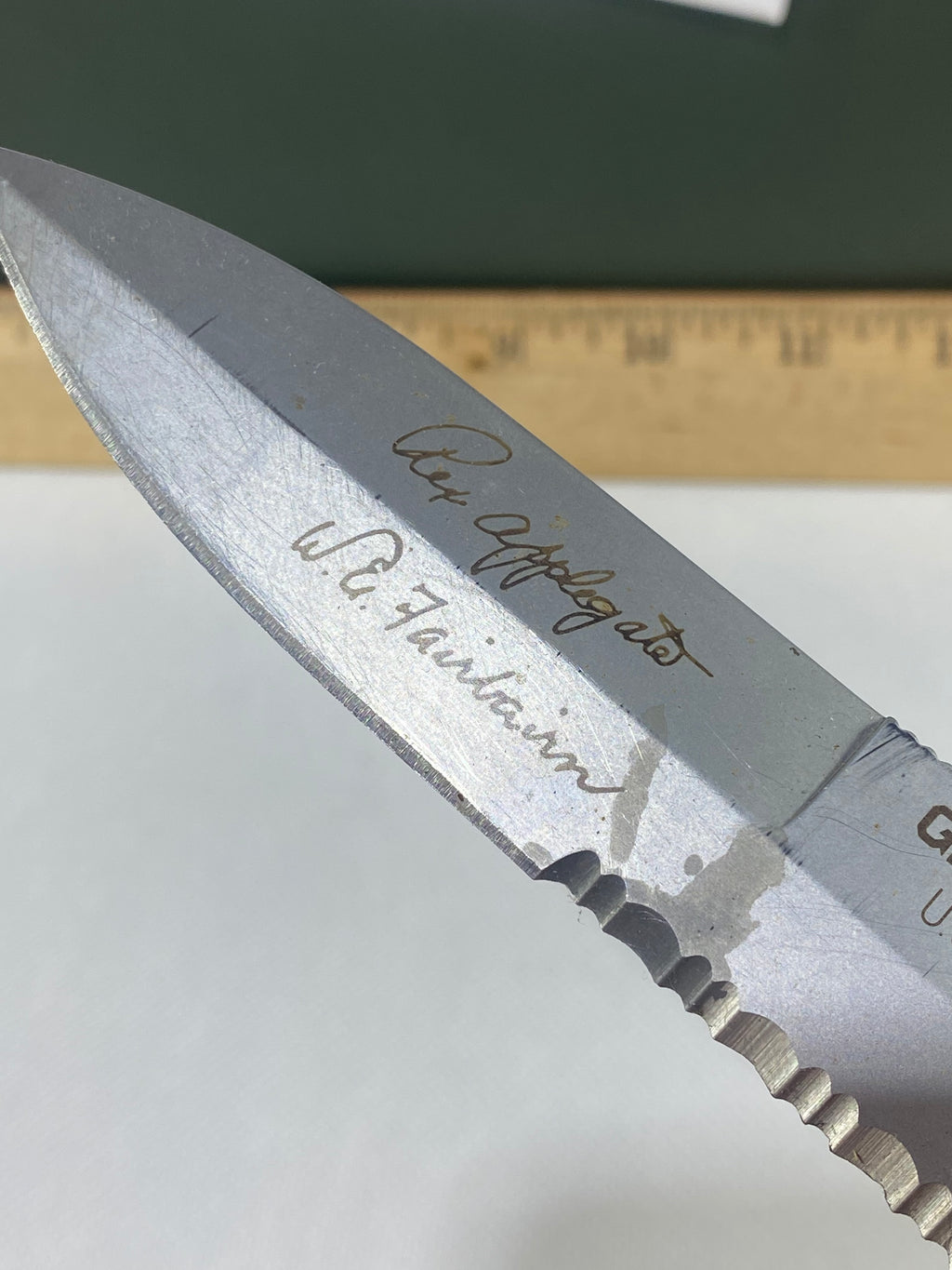 Gerber #-45. Applegate-Fairbairn Combat Folder. Light usage. Dirty. Blade has someone's name scratched on it.