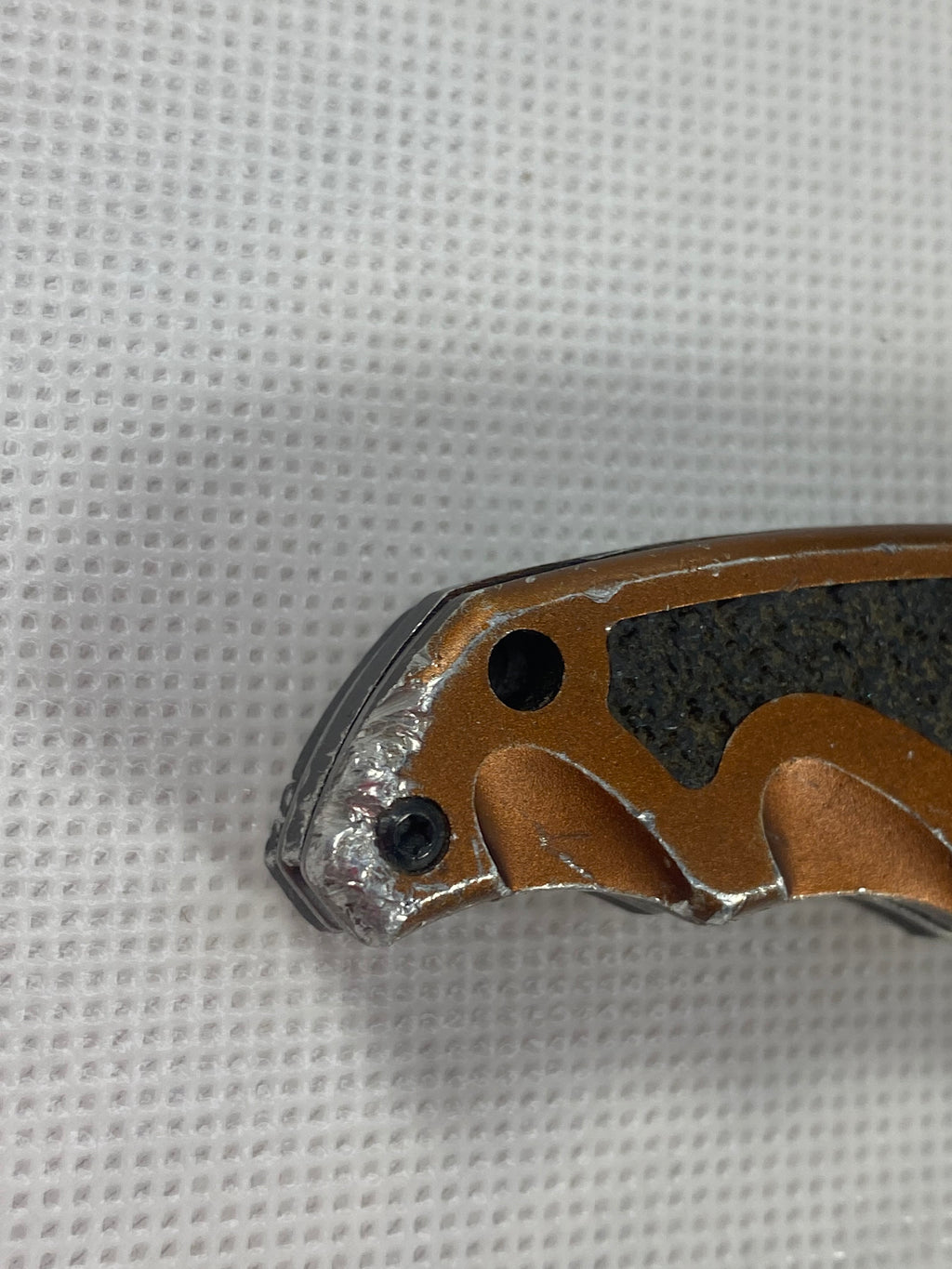 Gerber #-54. Answer F.A.S.T. Light usage. Dirty. Chip on blade. Handle bruised.