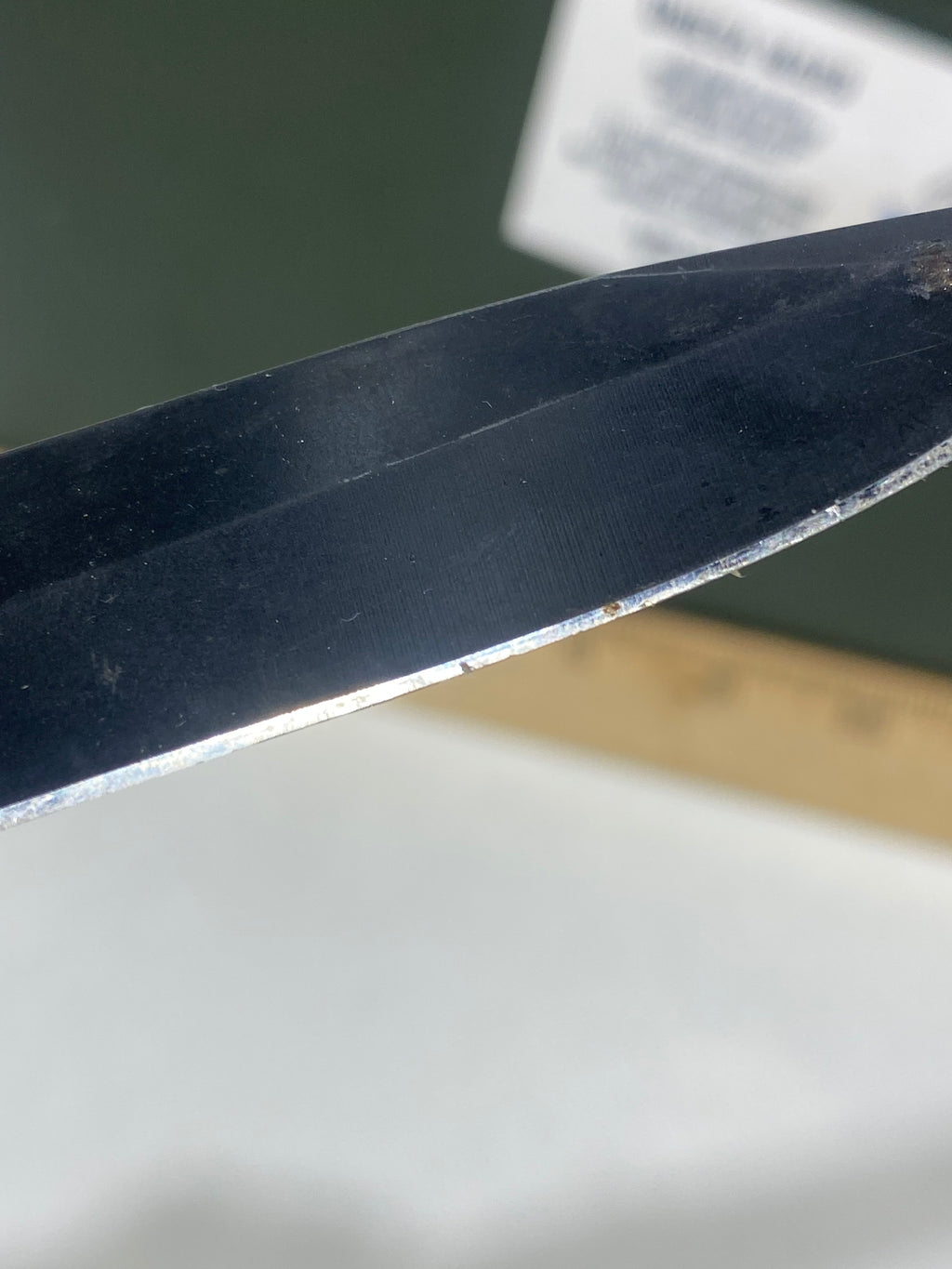 Gerber #-54. Answer F.A.S.T. Light usage. Dirty. Chip on blade. Handle bruised.
