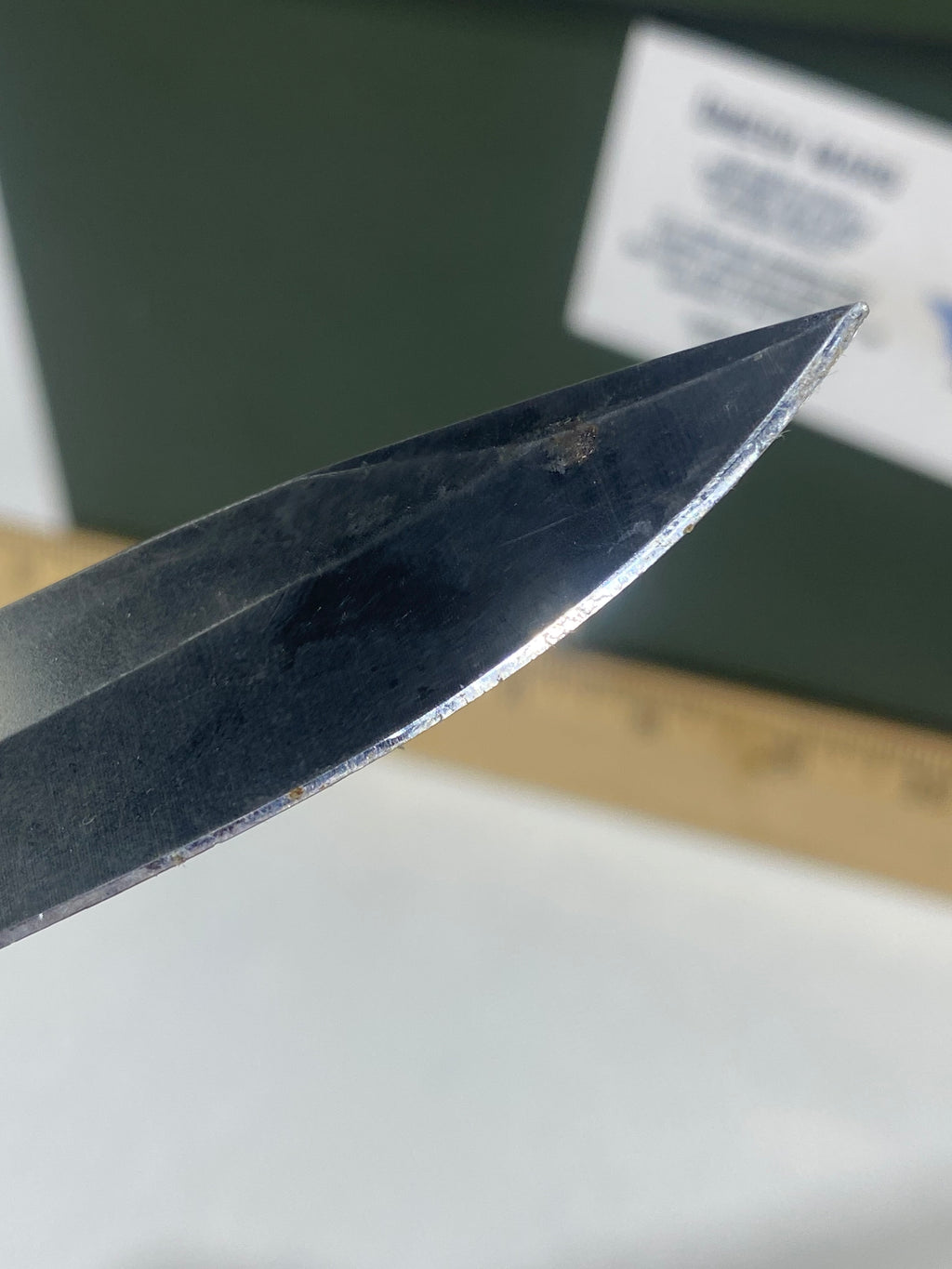 Gerber #-54. Answer F.A.S.T. Light usage. Dirty. Chip on blade. Handle bruised.