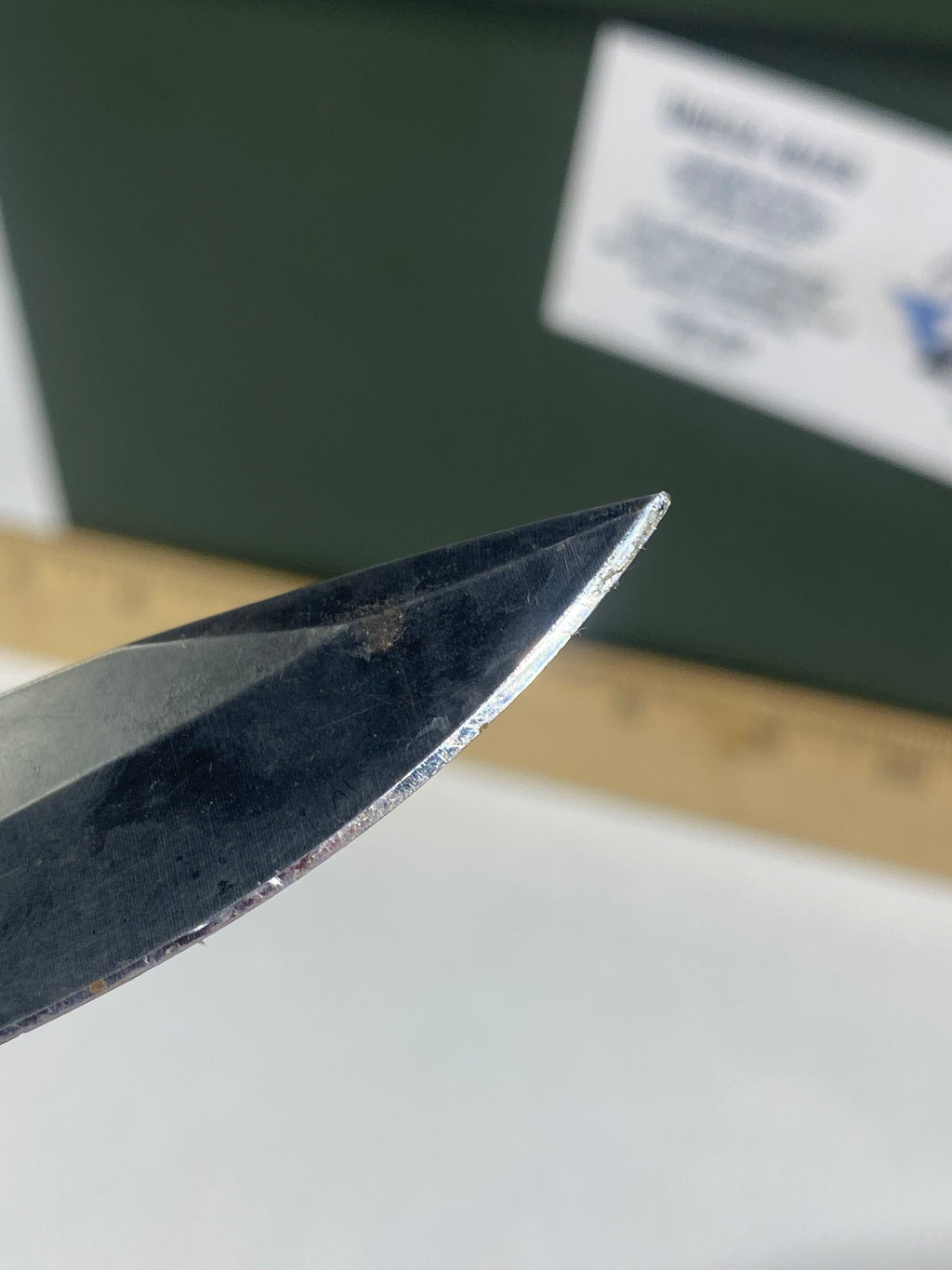 Gerber #-54. Answer F.A.S.T. Light usage. Dirty. Chip on blade. Handle bruised.