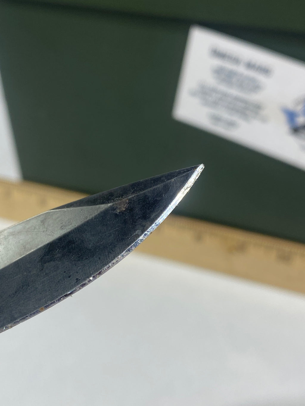 Gerber #-54. Answer F.A.S.T. Light usage. Dirty. Chip on blade. Handle bruised.