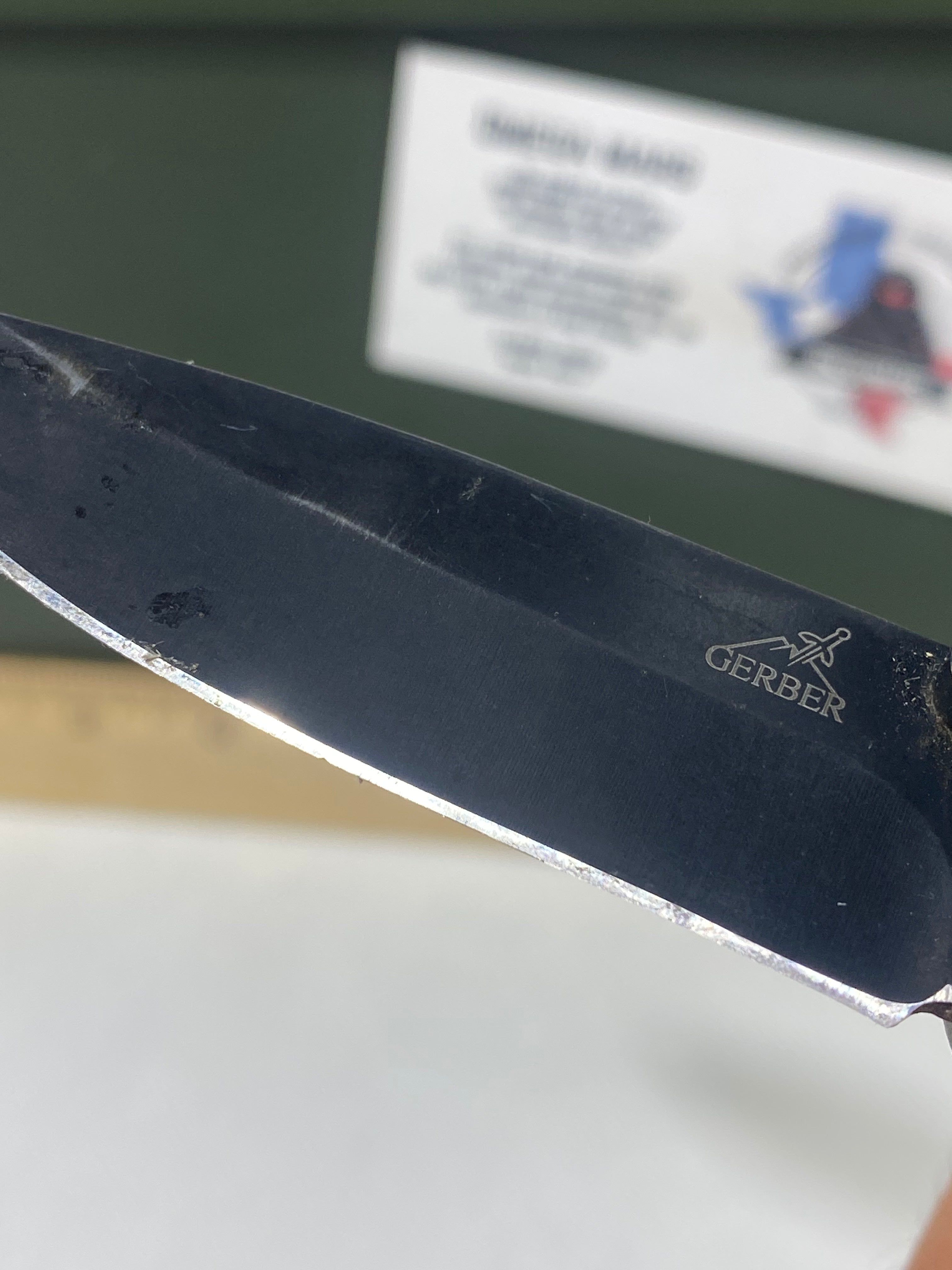 Gerber #-54. Answer F.A.S.T. Light usage. Dirty. Chip on blade. Handle bruised.