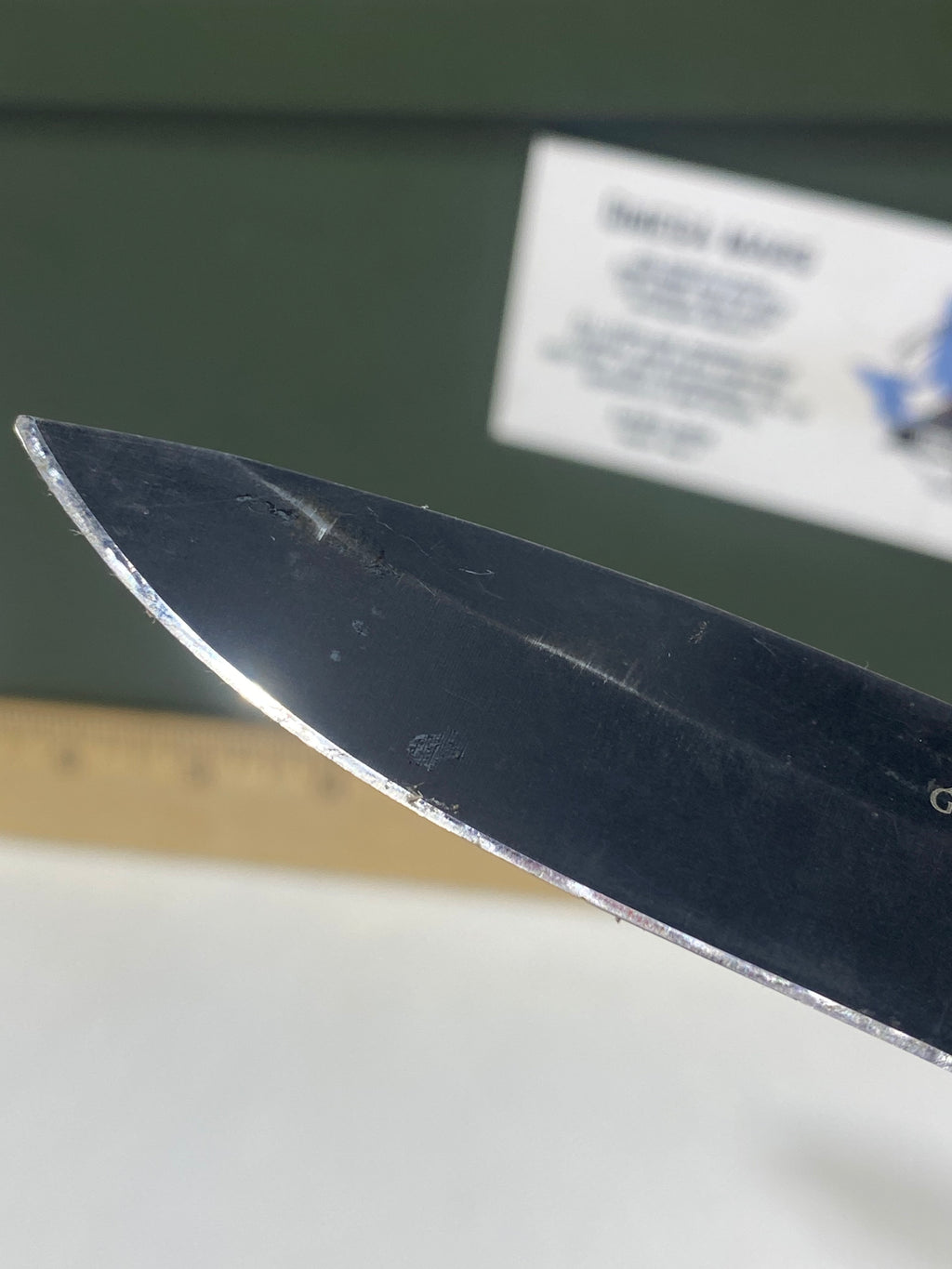 Gerber #-54. Answer F.A.S.T. Light usage. Dirty. Chip on blade. Handle bruised.