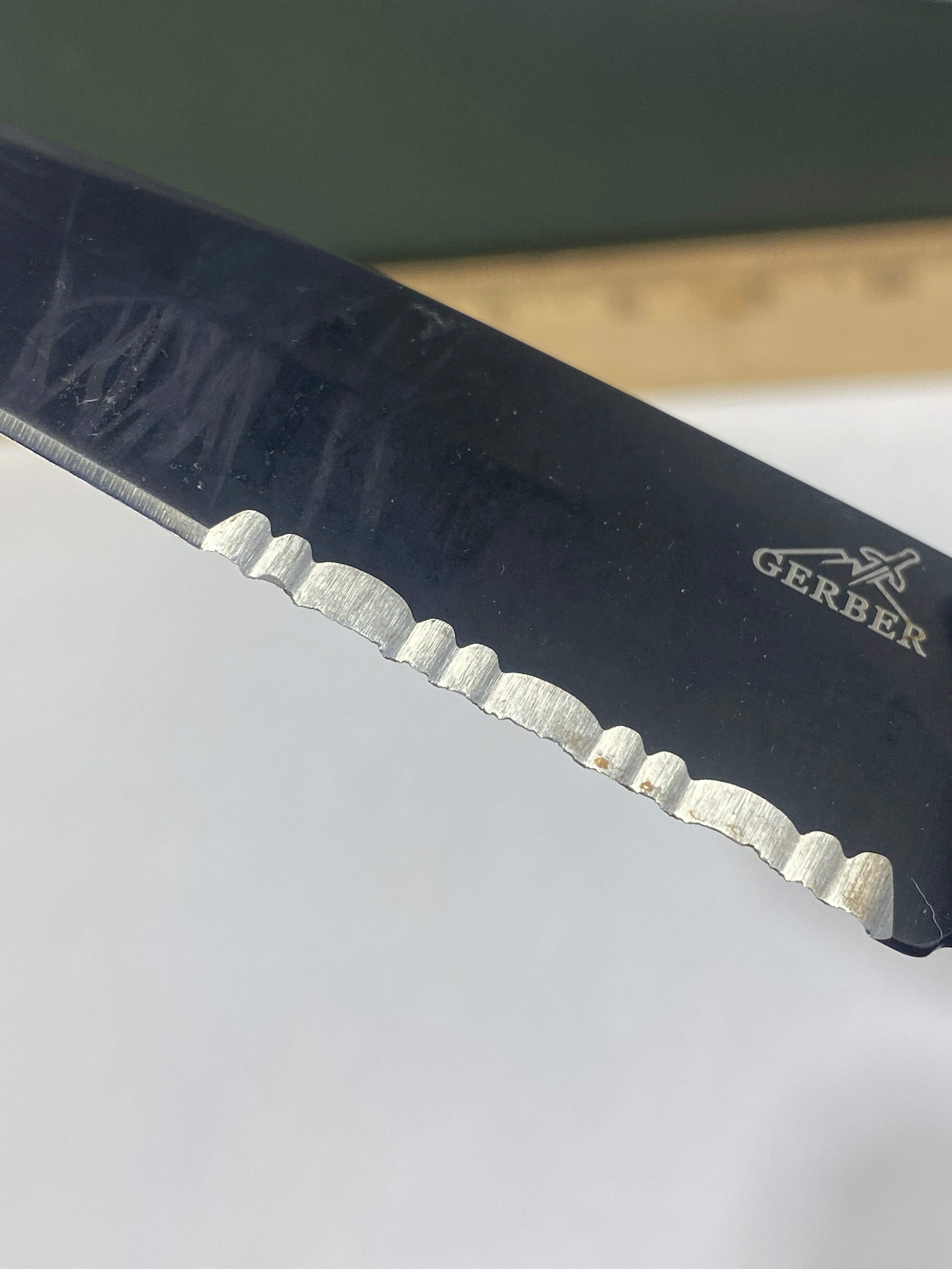 Gerber #-56. Answer F.A.S.T. Light usage. Chips on blade.
