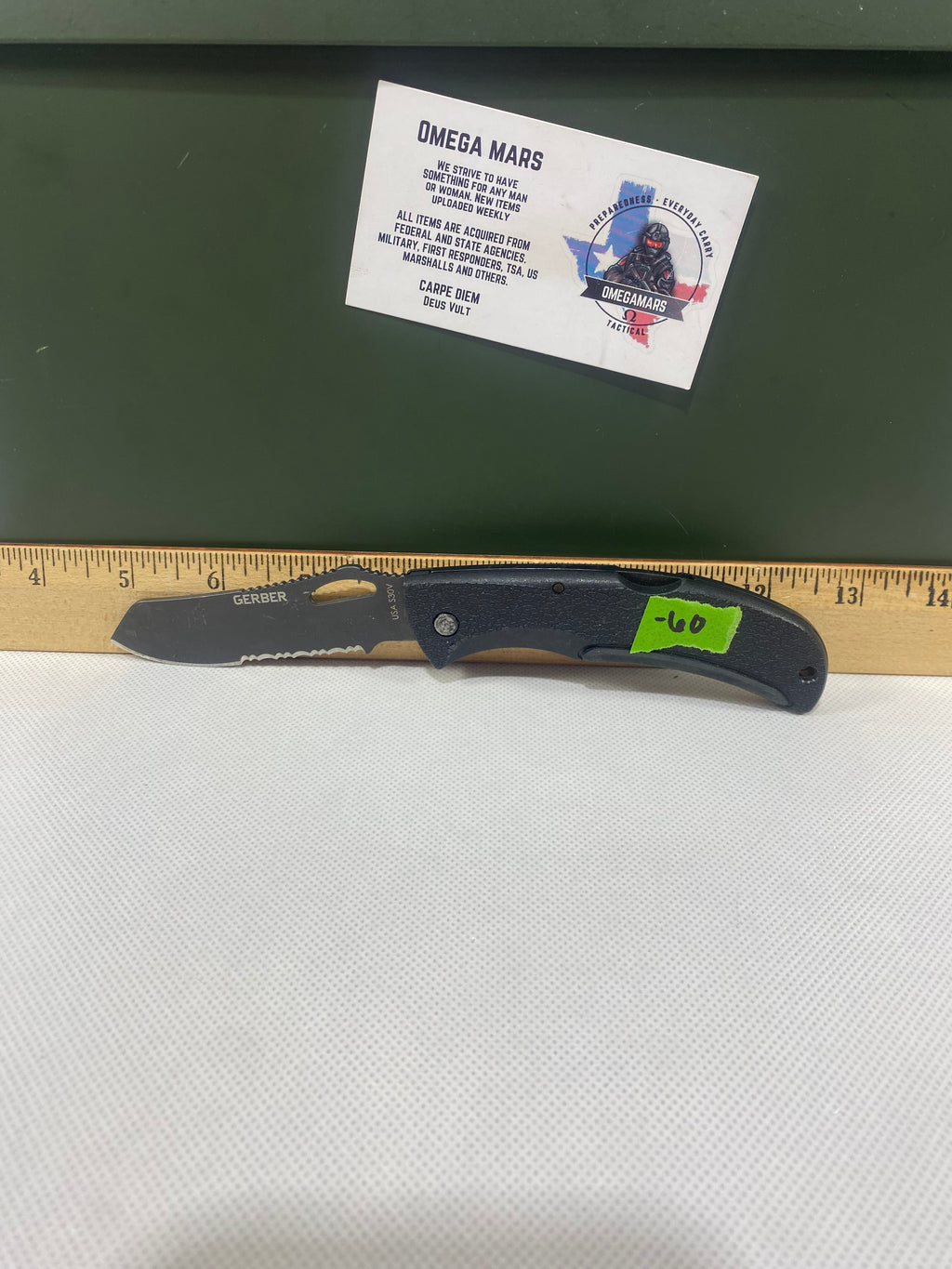 Gerber #-60. E-Z Out DPSF. Light usage. Dings on blade. Dirty.