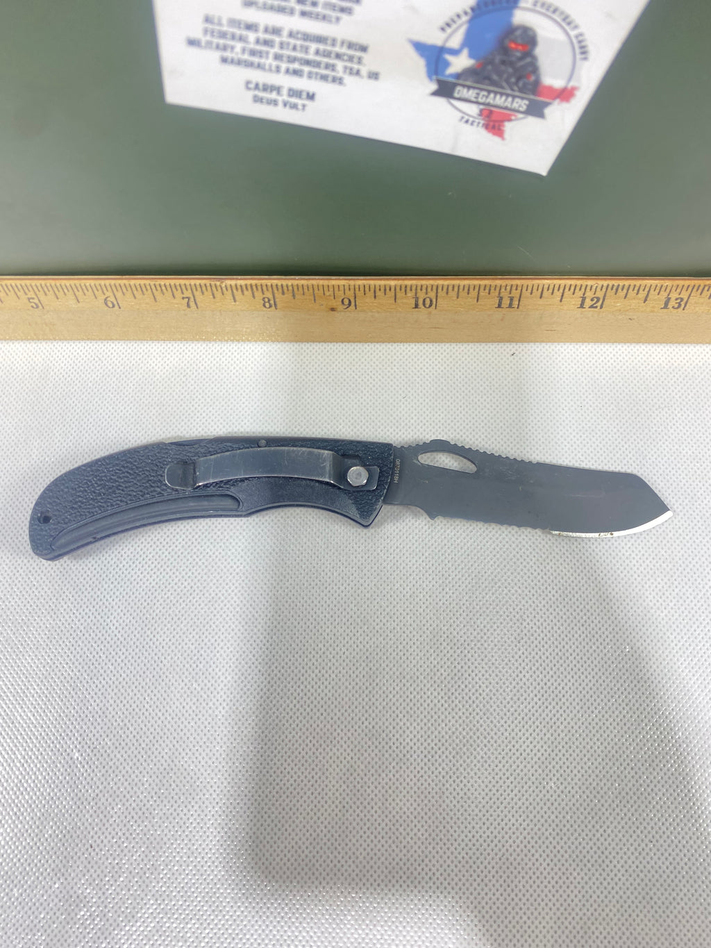 Gerber #-60. E-Z Out DPSF. Light usage. Dings on blade. Dirty.