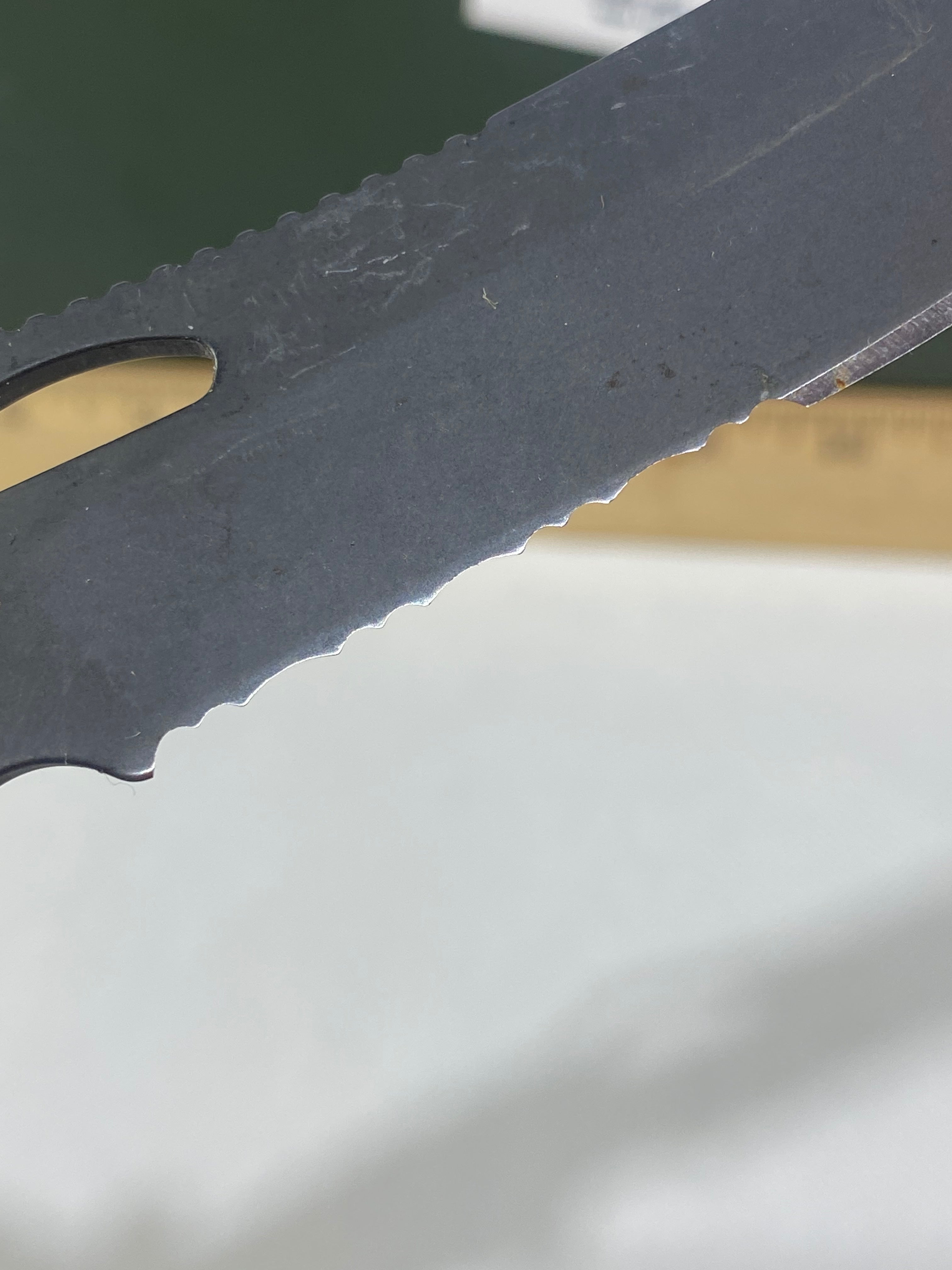 Gerber #-60. E-Z Out DPSF. Light usage. Dings on blade. Dirty.