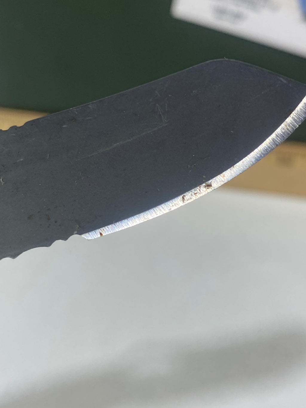 Gerber #-60. E-Z Out DPSF. Light usage. Dings on blade. Dirty.