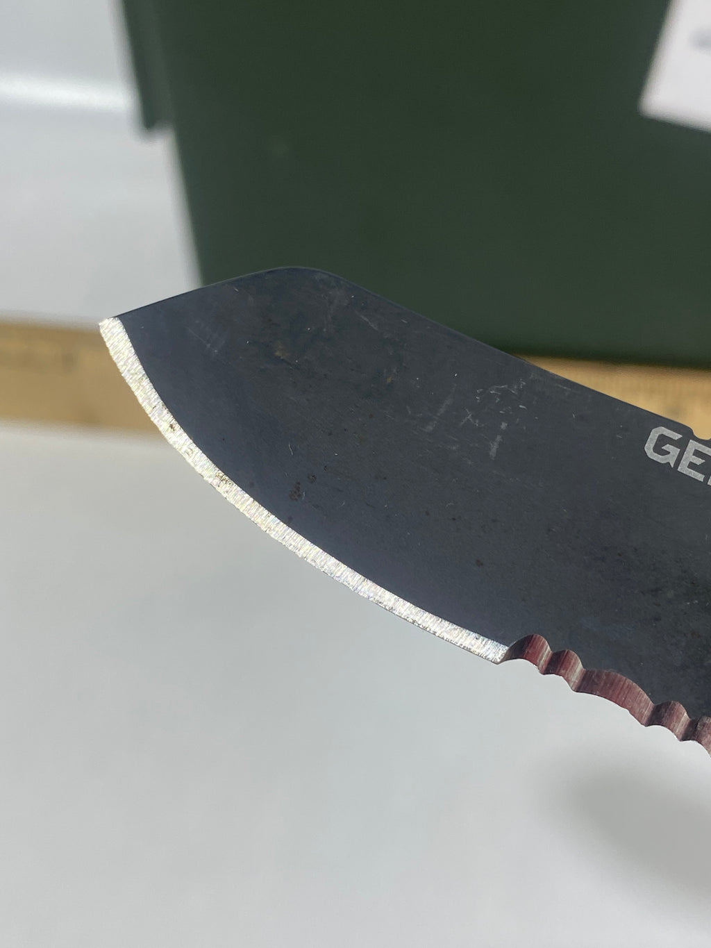 Gerber #-60. E-Z Out DPSF. Light usage. Dings on blade. Dirty.